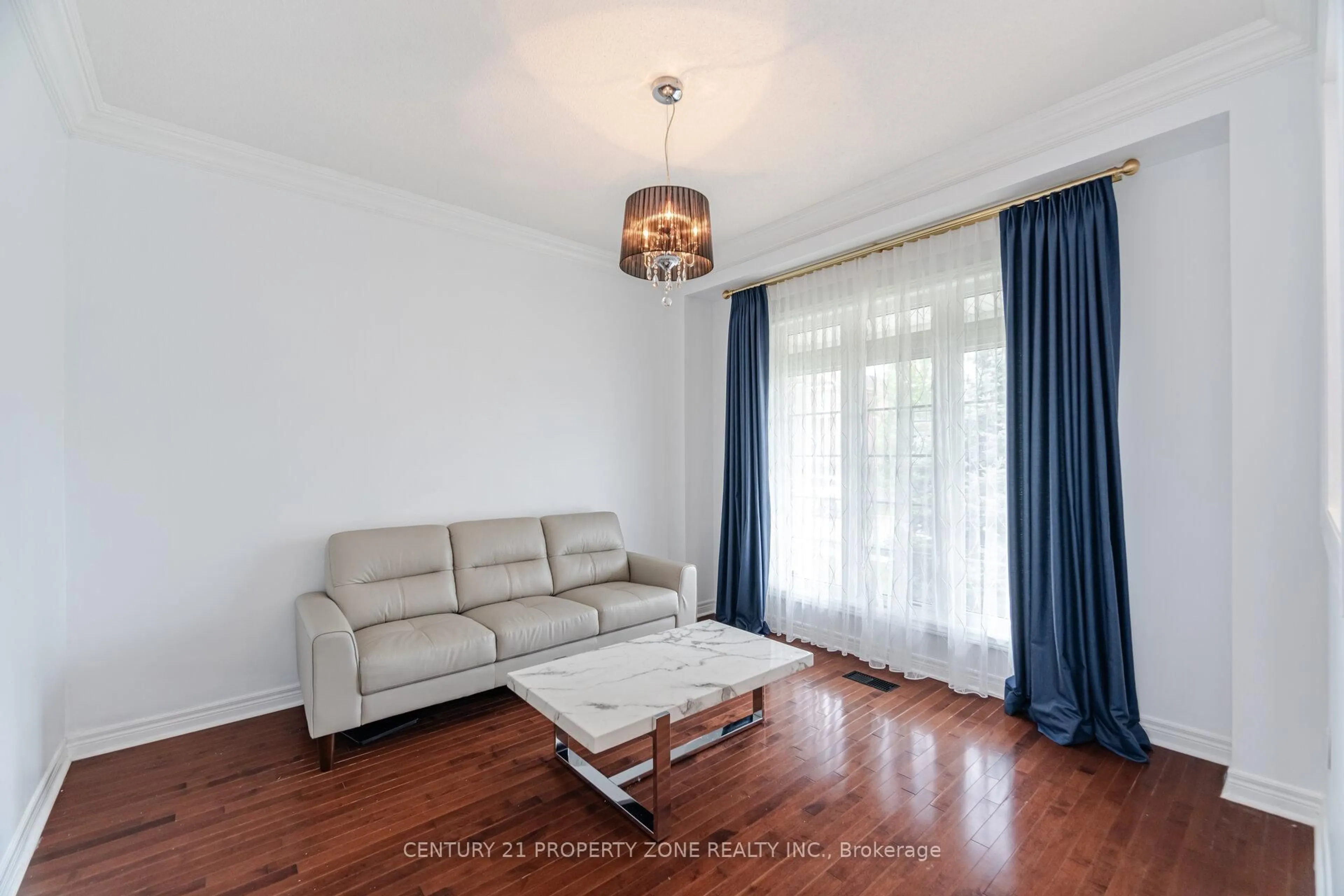 Living room with furniture, wood/laminate floor for 22 Lucky Lane, Brampton Ontario L6R 3M3