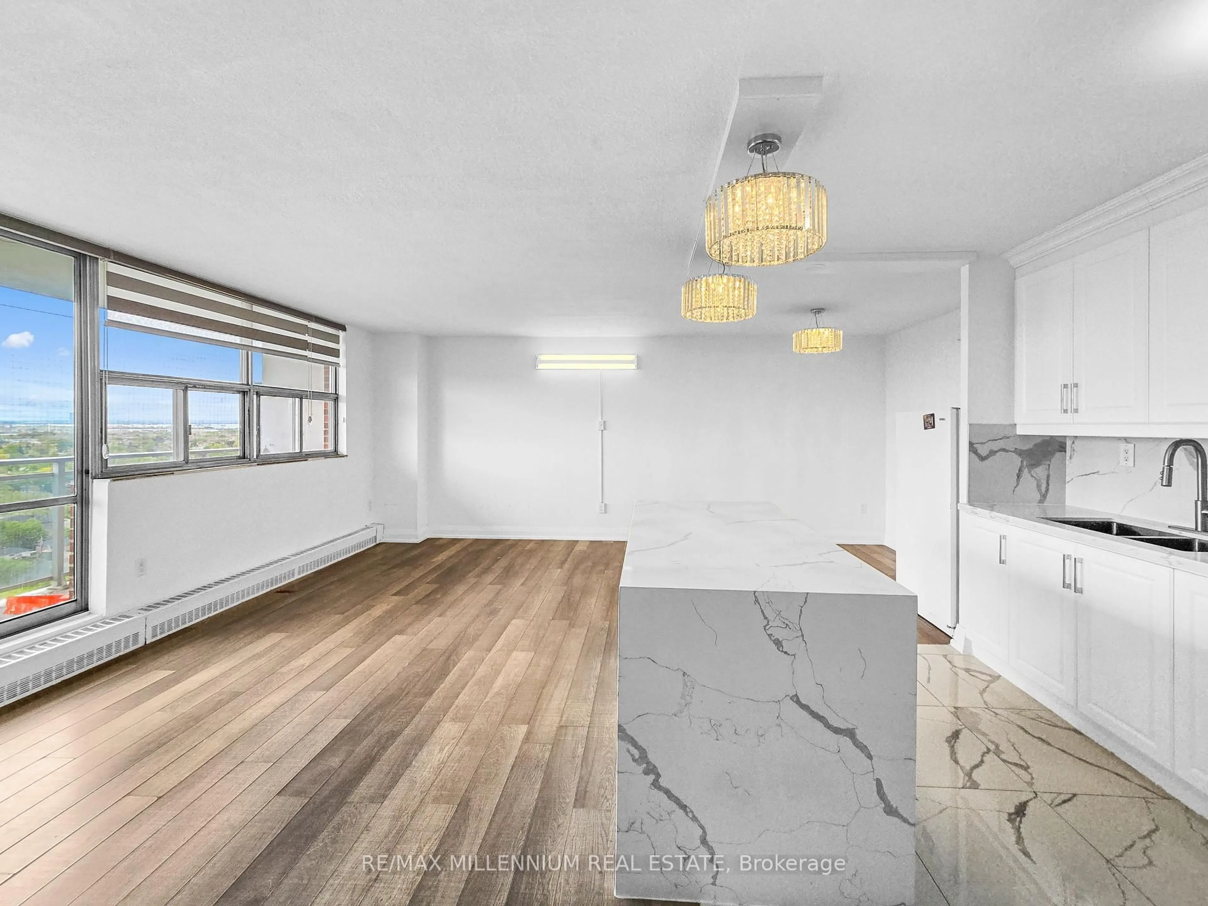 Open concept kitchen, wood/laminate floor for 2645 Kipling Ave #1807, Toronto Ontario M9V 3S6