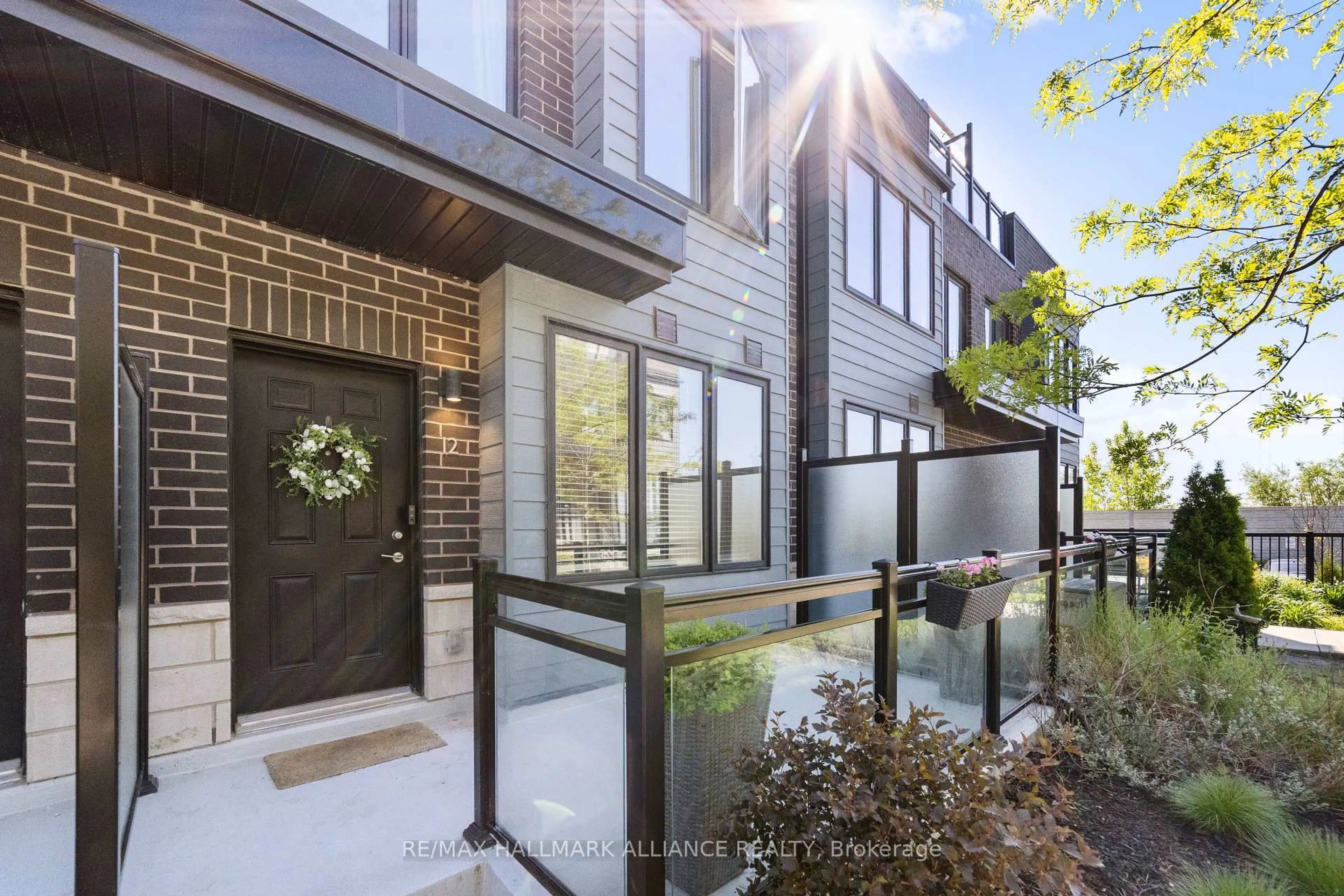 Home with brick exterior material, street for 1150 Stroud Lane #12, Mississauga Ontario L5J 0B3