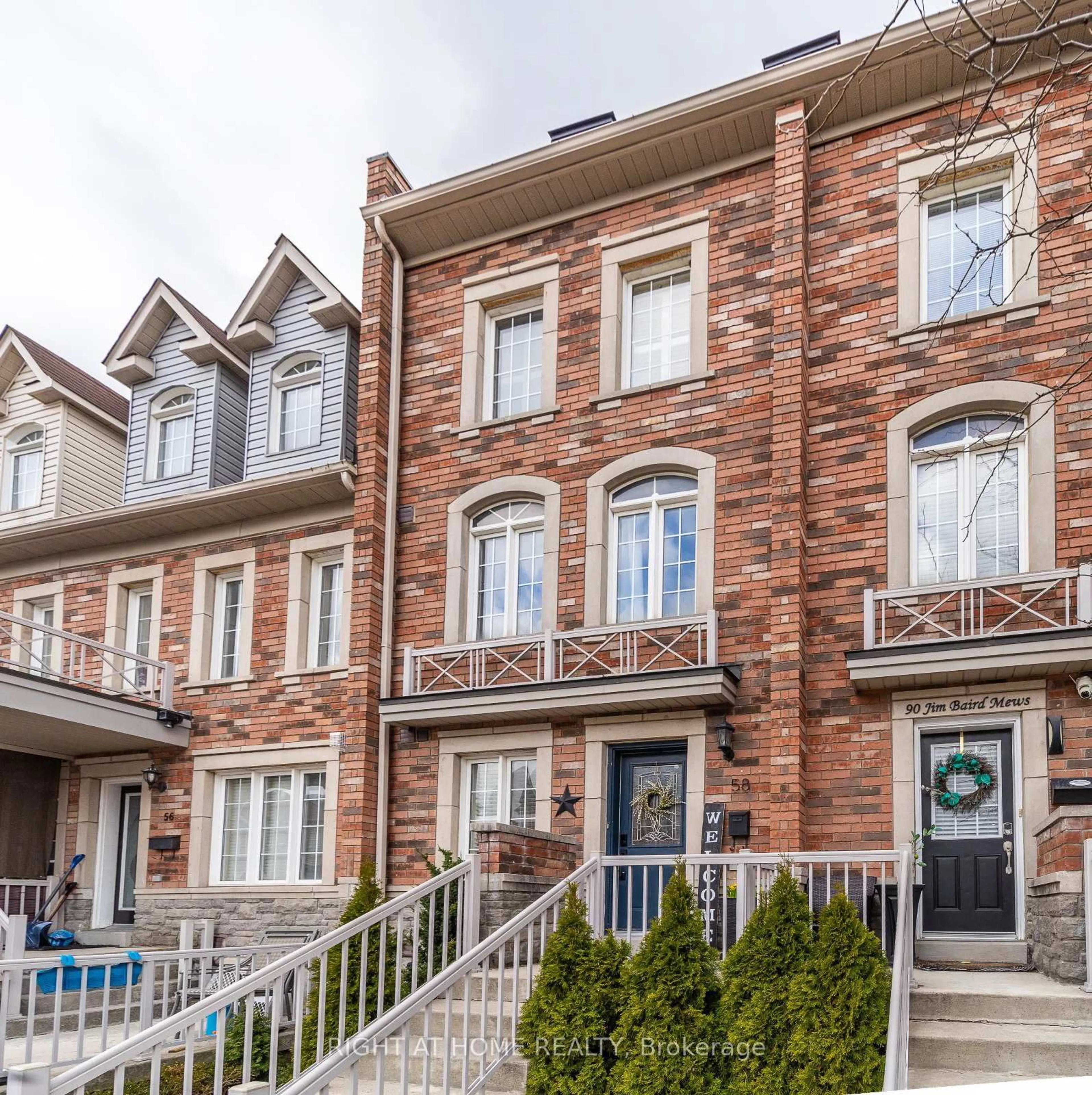 Home with brick exterior material, street for 58 Joseph Griffith Lane, Toronto Ontario M3L 0C7