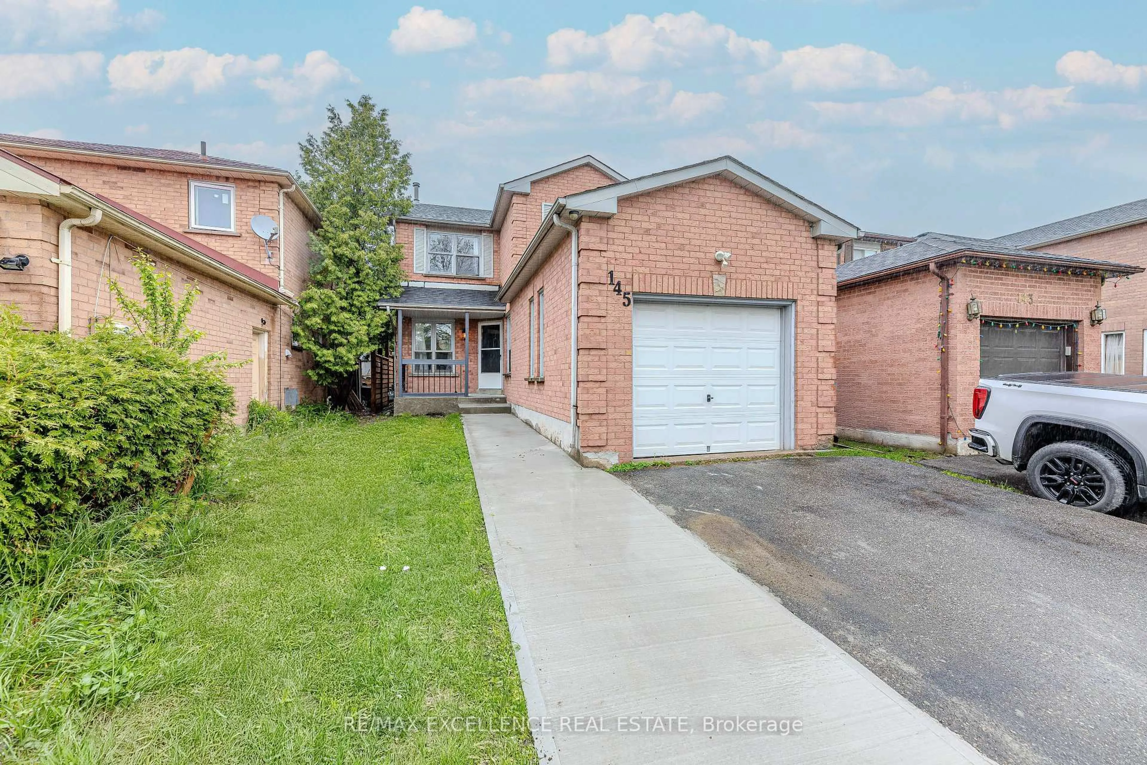 Home with brick exterior material, street for 145 Ecclestone Dr, Brampton Ontario L6X 3P7