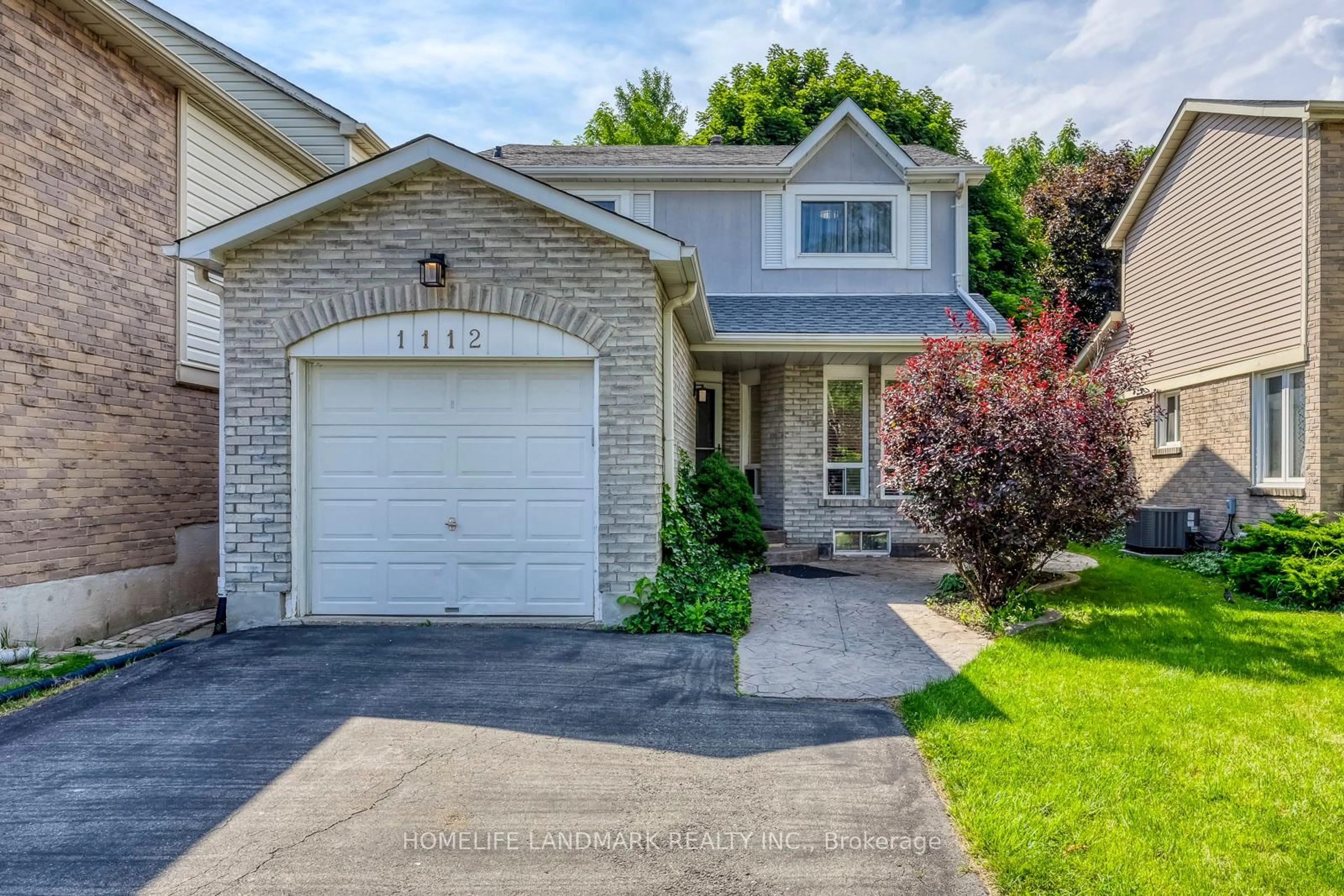 Home with brick exterior material, street for 1112 Montgomery Dr, Oakville Ontario L6M 1G1