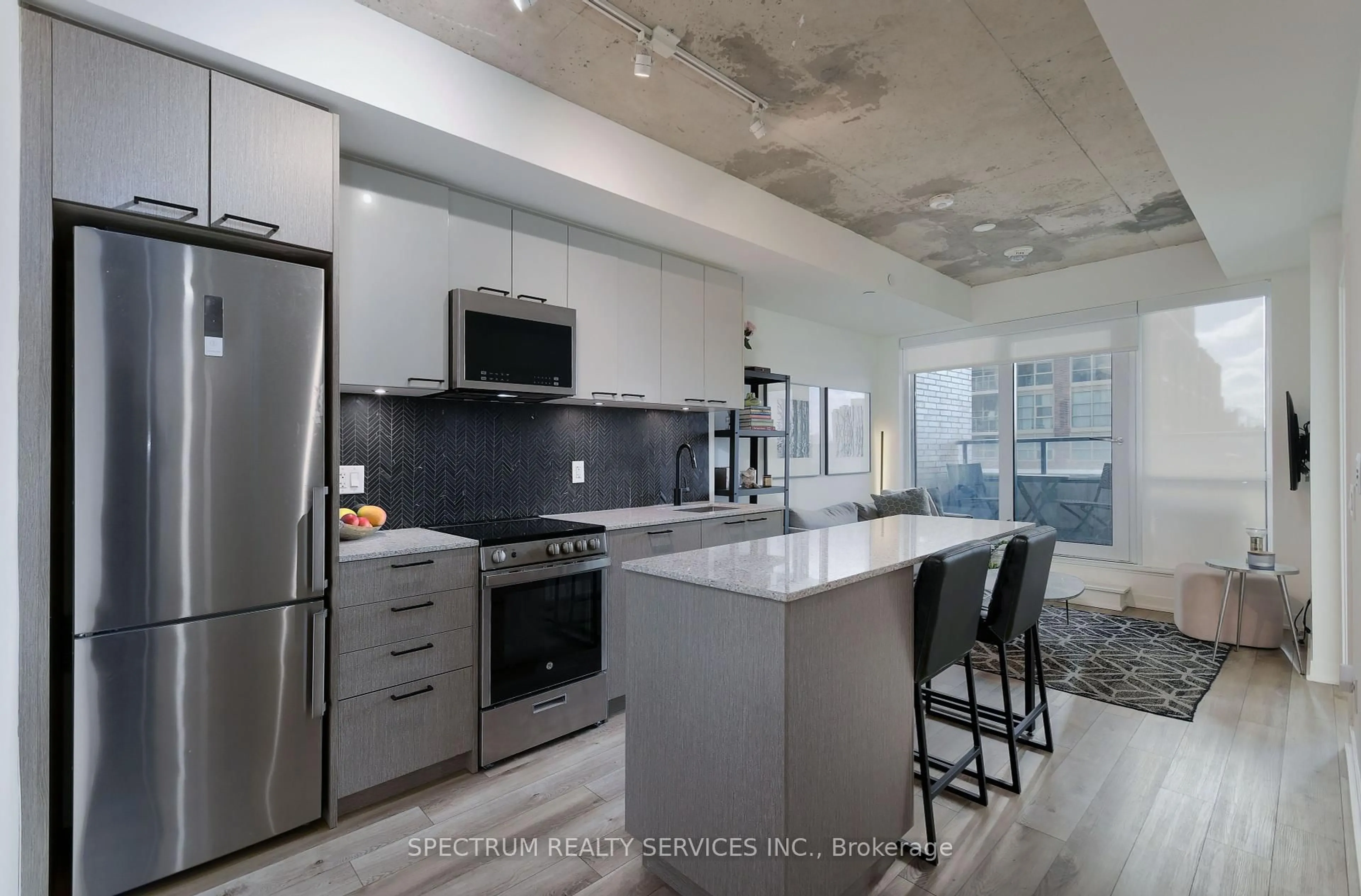 Open concept kitchen, ceramic/tile floor for 1808 St. Clair Ave #215, Toronto Ontario M6N 0C1
