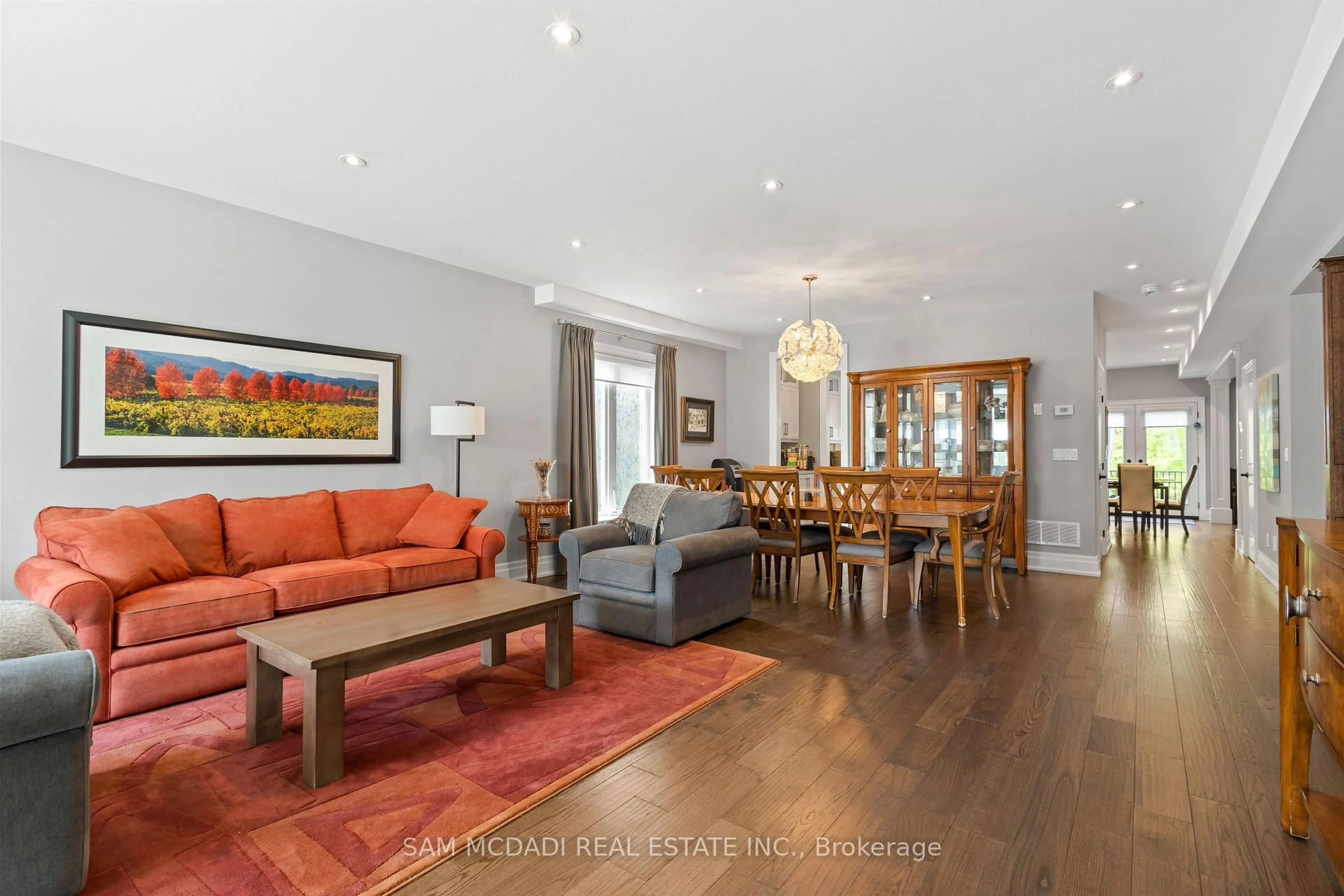 Living room with furniture, wood/laminate floor for 1487 Myron Dr, Mississauga Ontario L5E 2N5