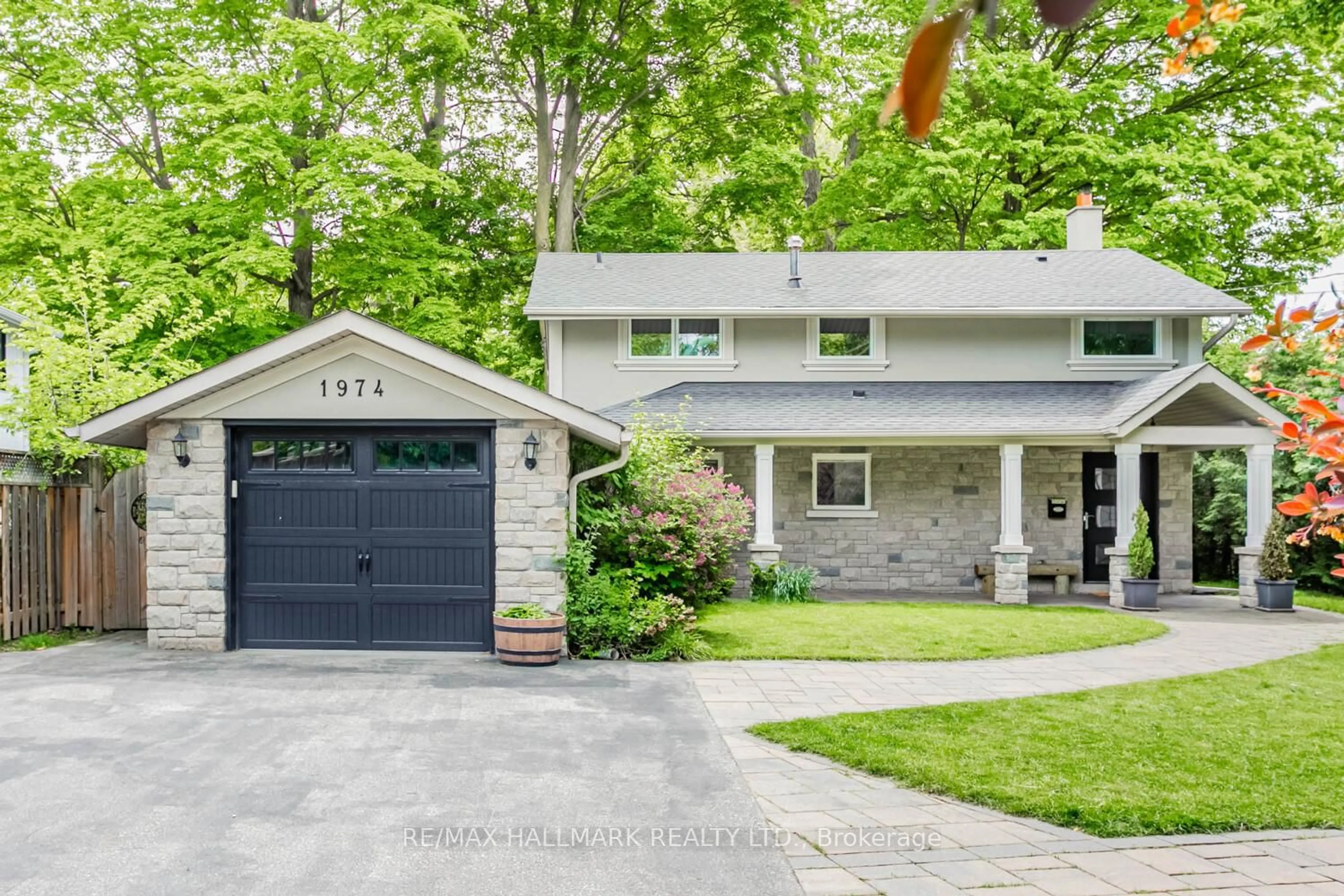 Home with brick exterior material, street for 1974 Truscott Dr, Mississauga Ontario L5J 2A5