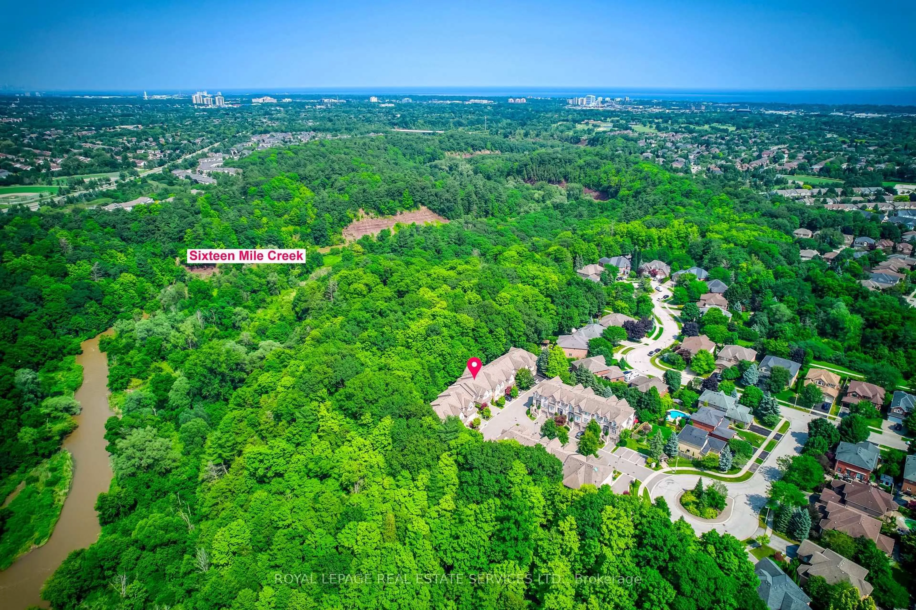 A pic from outside/outdoor area/front of a property/back of a property/a pic from drone, forest/trees view for 2303 Hill Ridge Crt #10, Oakville Ontario L6M 3N3