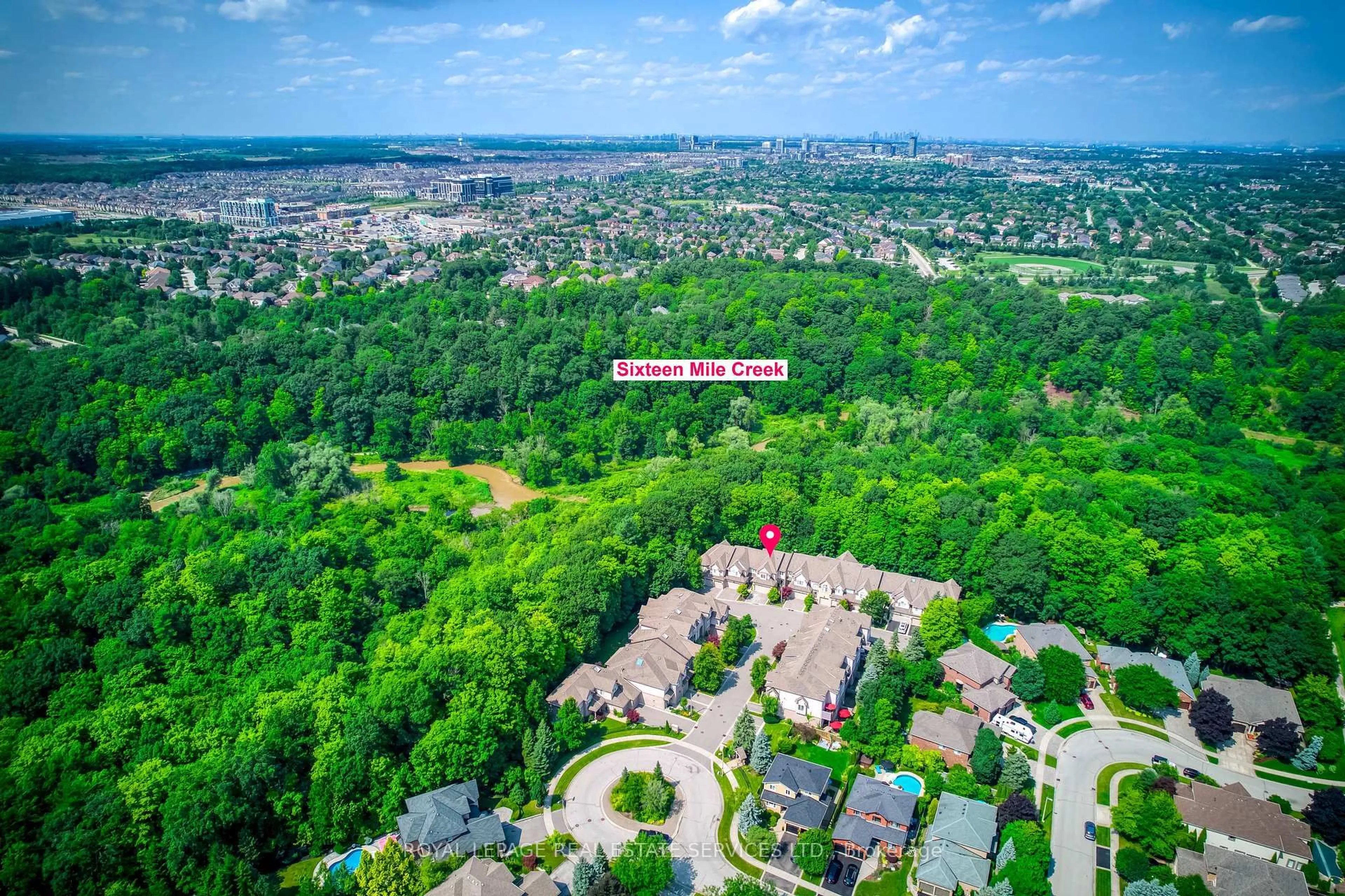 A pic from outside/outdoor area/front of a property/back of a property/a pic from drone, forest/trees view for 2303 Hill Ridge Crt #10, Oakville Ontario L6M 3N3