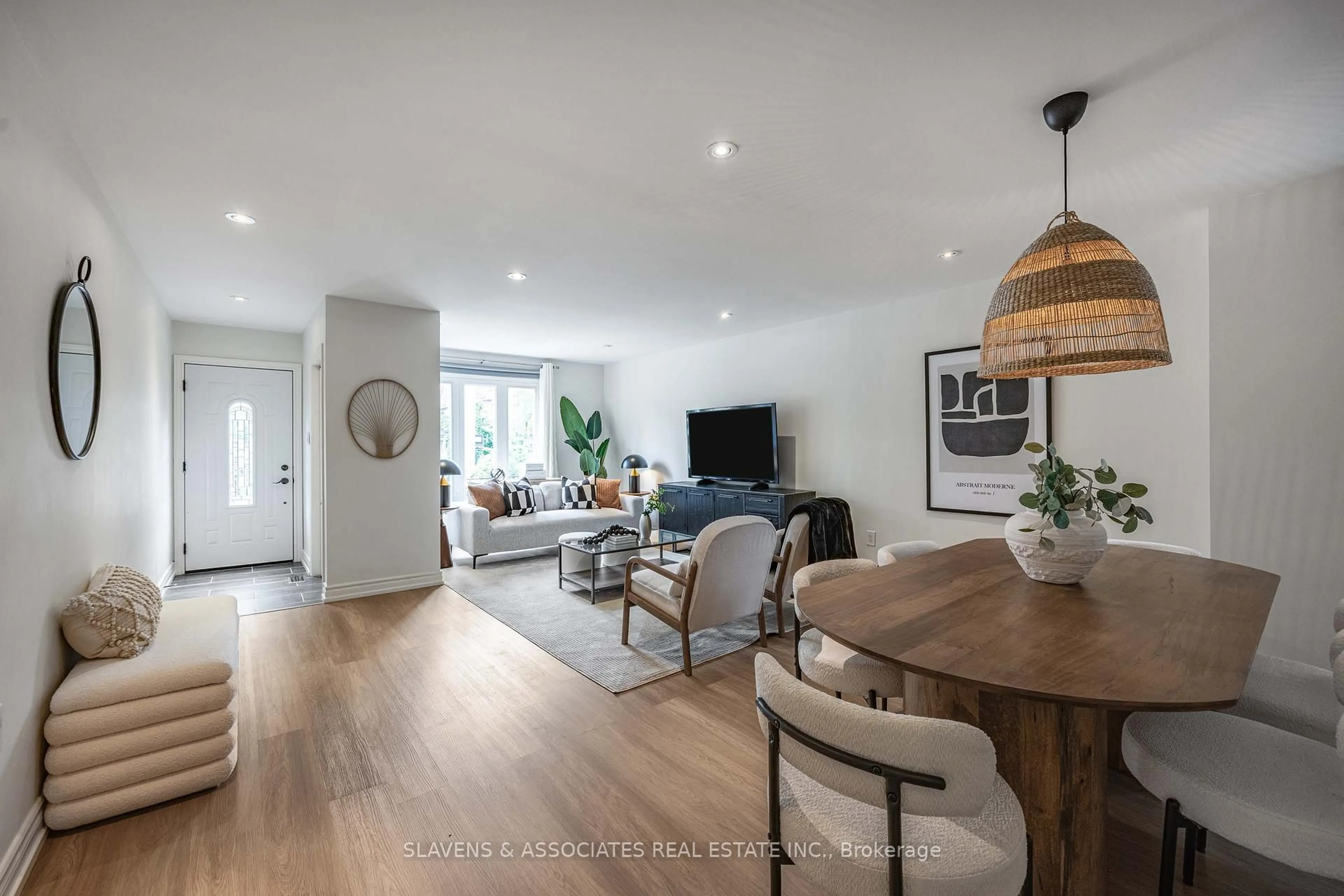 Living room with furniture, wood/laminate floor for 759 Shaw St, Toronto Ontario M6G 3L9