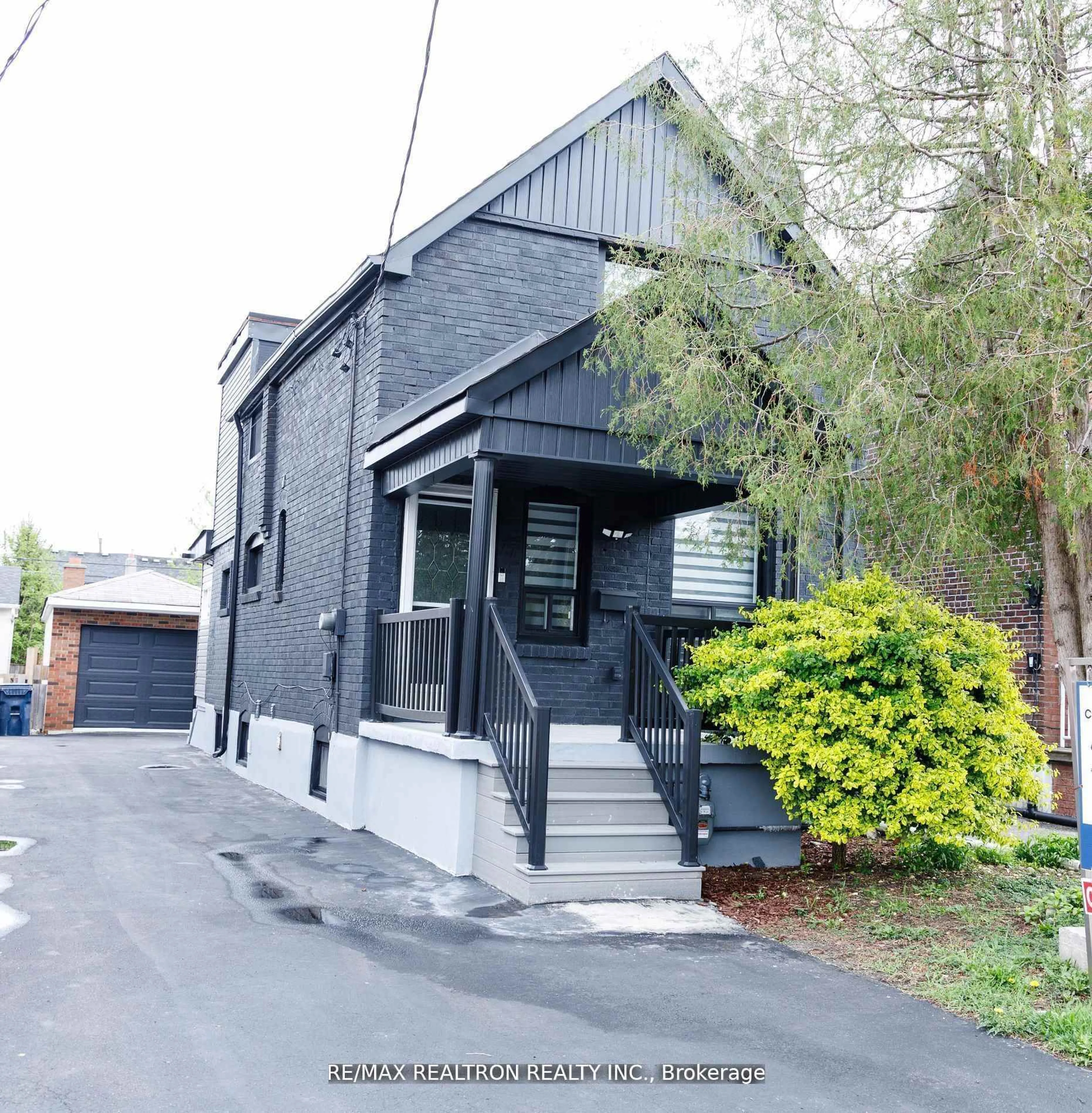 Home with vinyl exterior material, street for 77 Hatherley Rd, Toronto Ontario M6E 1V8