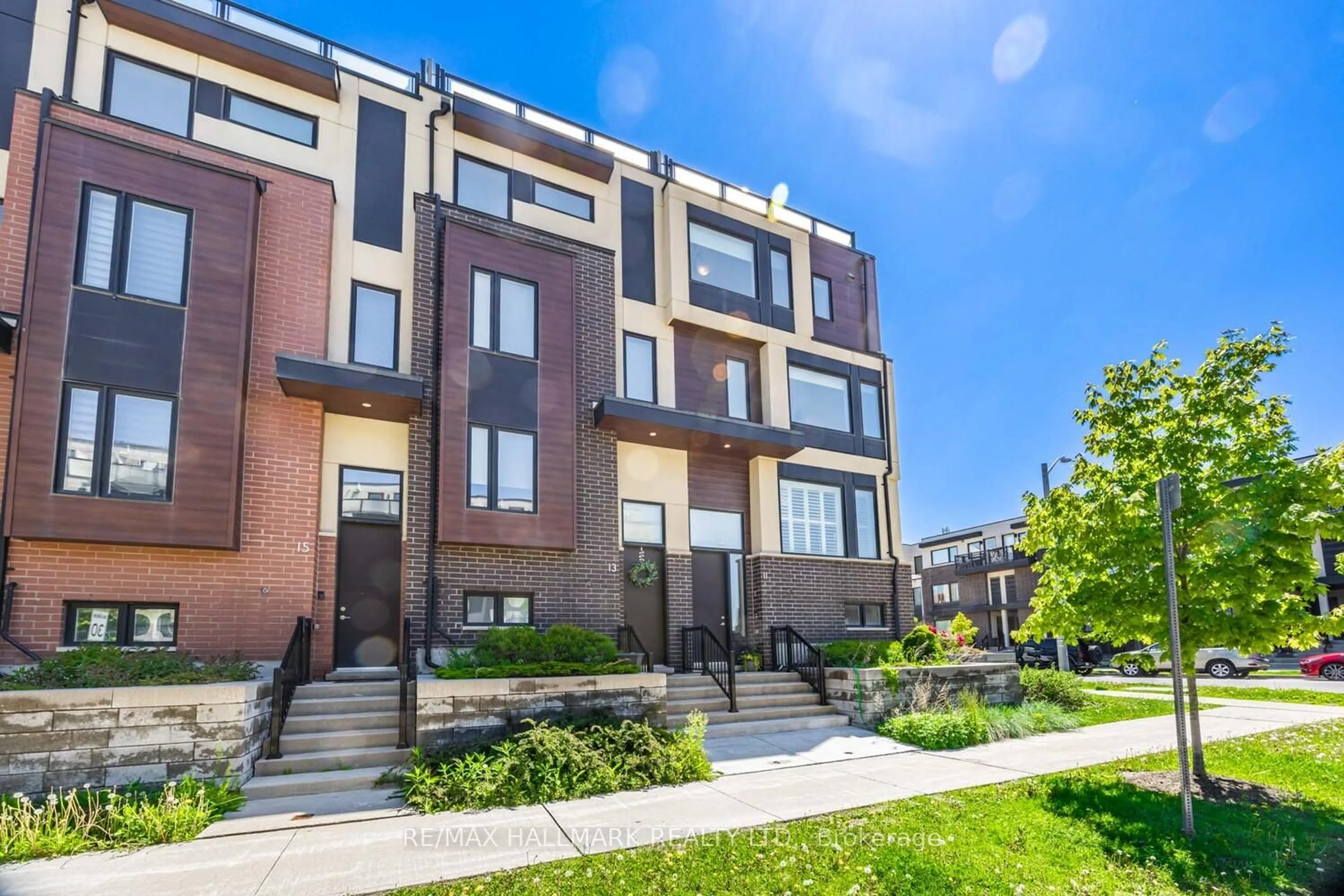 Home with brick exterior material, street for 11 Caroline Carpenter Grve, Toronto Ontario M3K 0B1