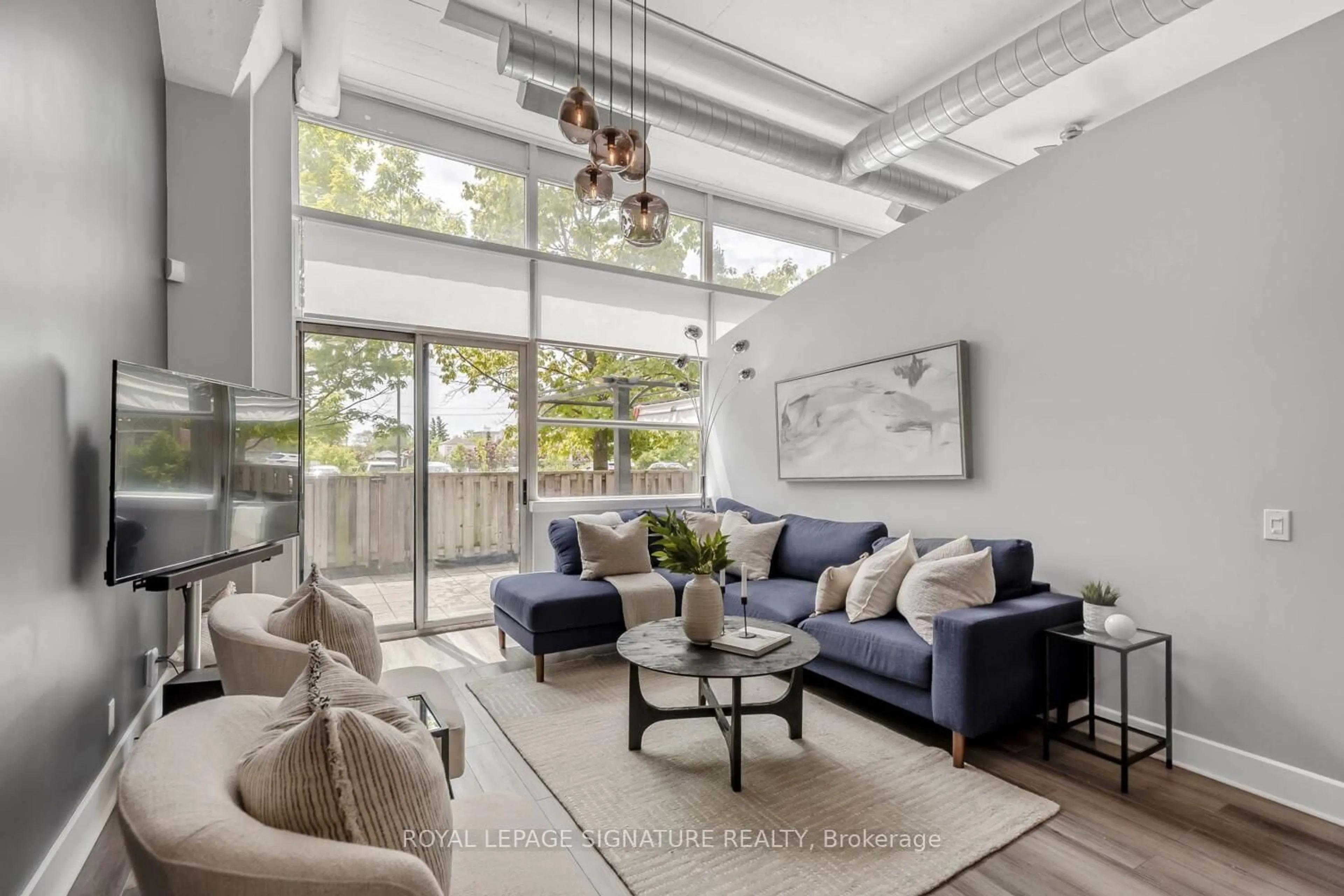 Living room with furniture, unknown for 1001 Roselawn Ave #108, Toronto Ontario M6B 4M4