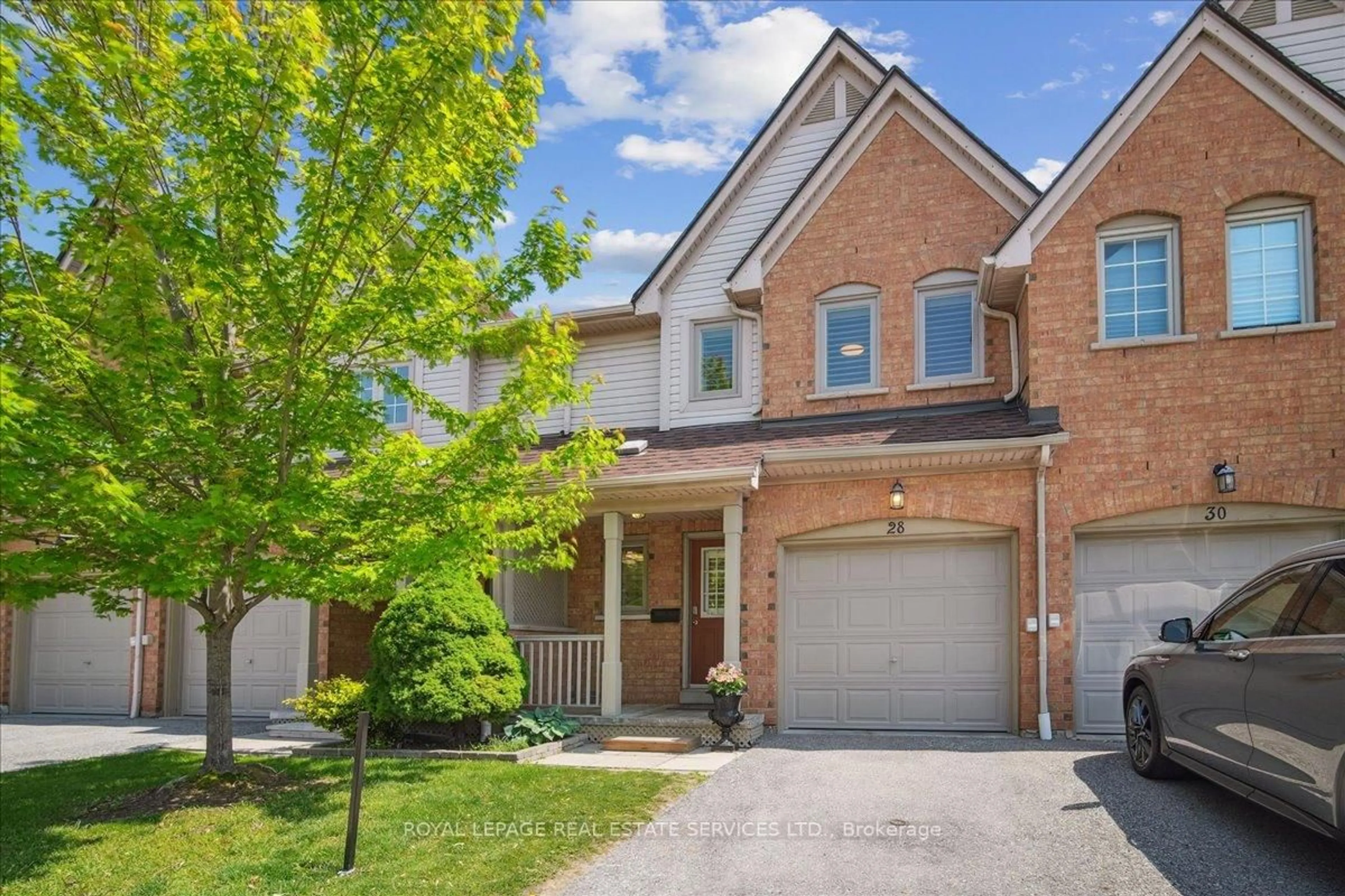 Home with brick exterior material, street for 5950 Glen Erin Dr #28, Mississauga Ontario L5M 5W9