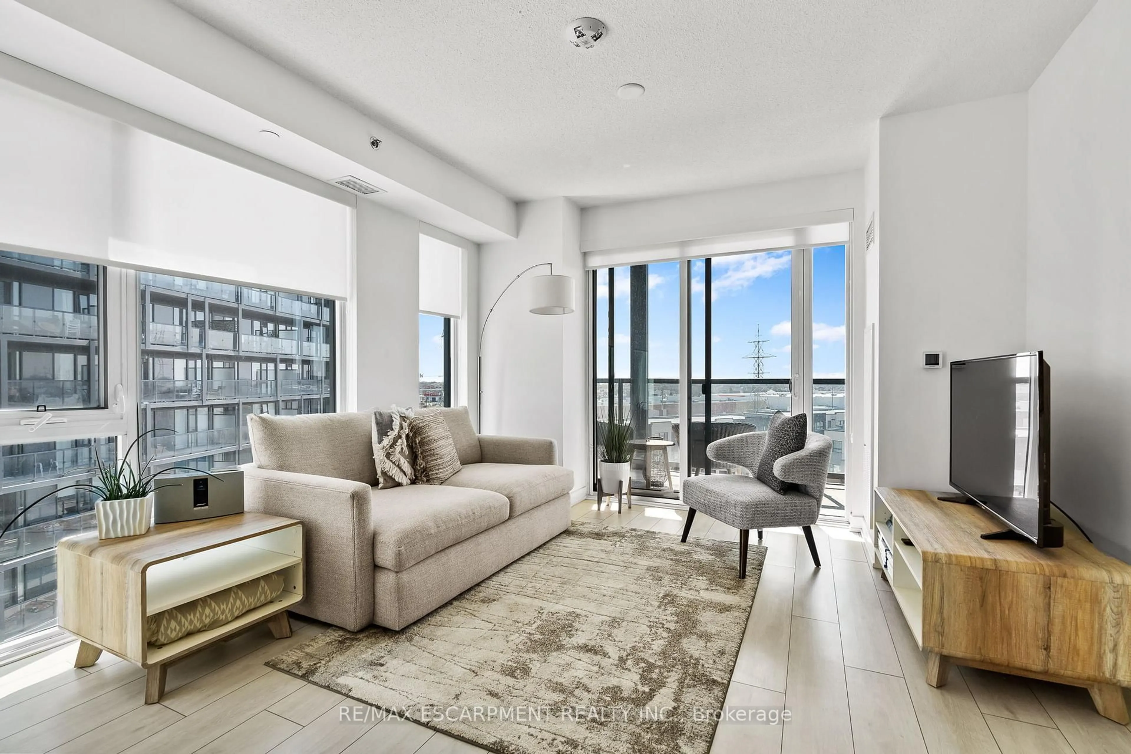 Living room with furniture, unknown for 3210 Dakota Common #A616, Burlington Ontario L7M 2A6