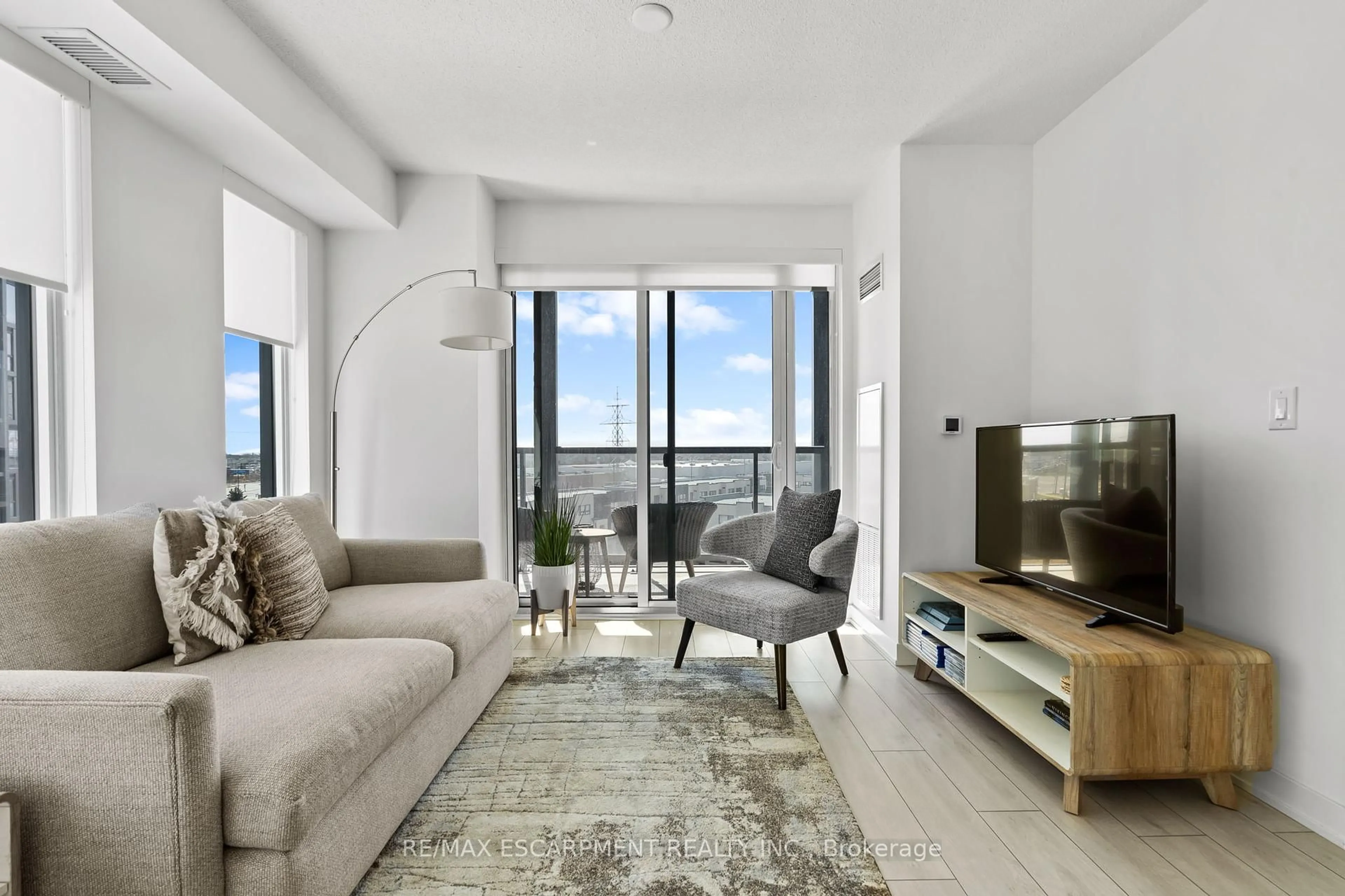 Living room with furniture, unknown for 3210 Dakota Common #A616, Burlington Ontario L7M 2A6