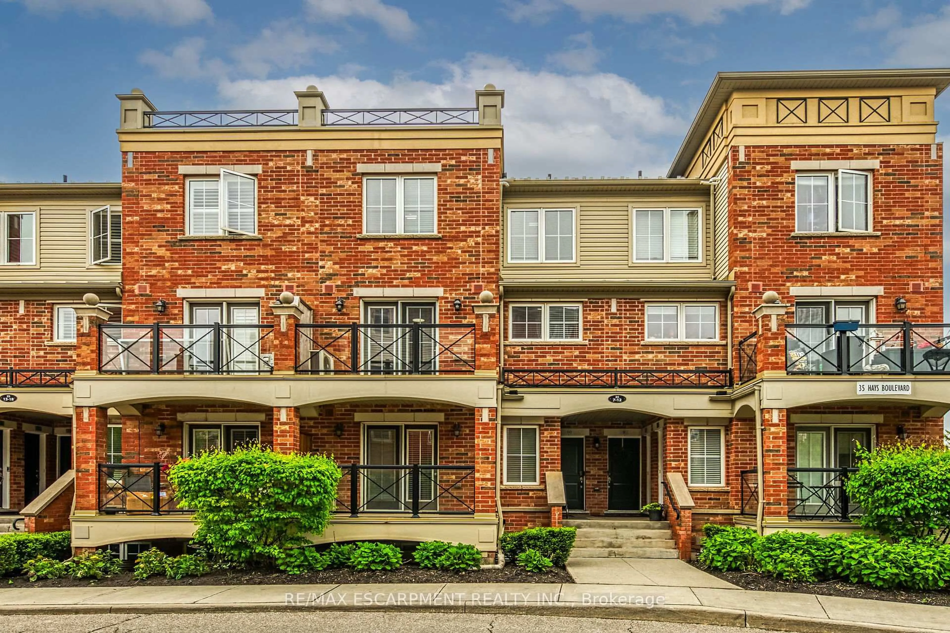 Home with brick exterior material, street for 35 Hays Blvd #11, Oakville Ontario L6H 0J1