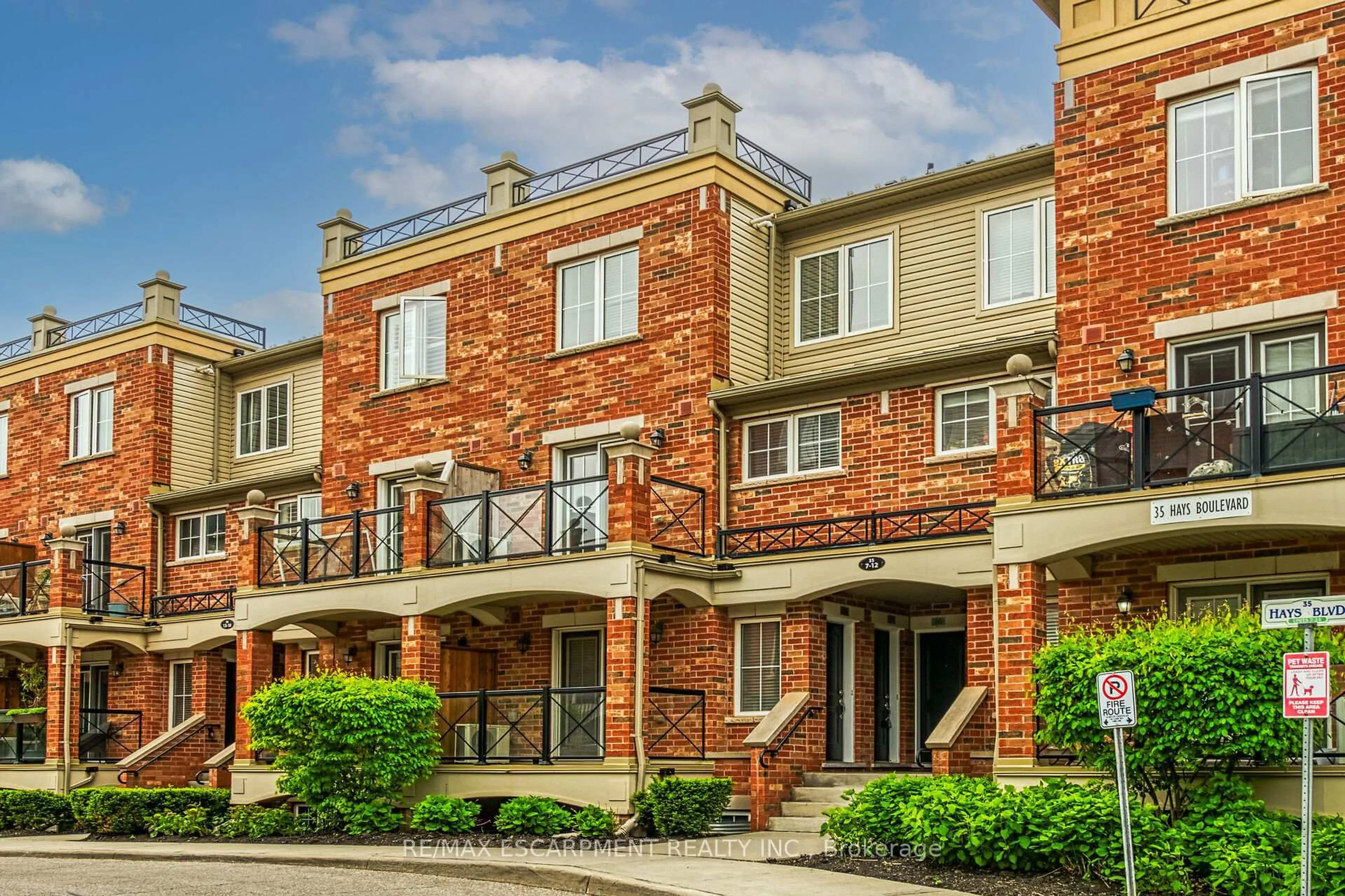 Home with brick exterior material, street for 35 Hays Blvd #11, Oakville Ontario L6H 0J1