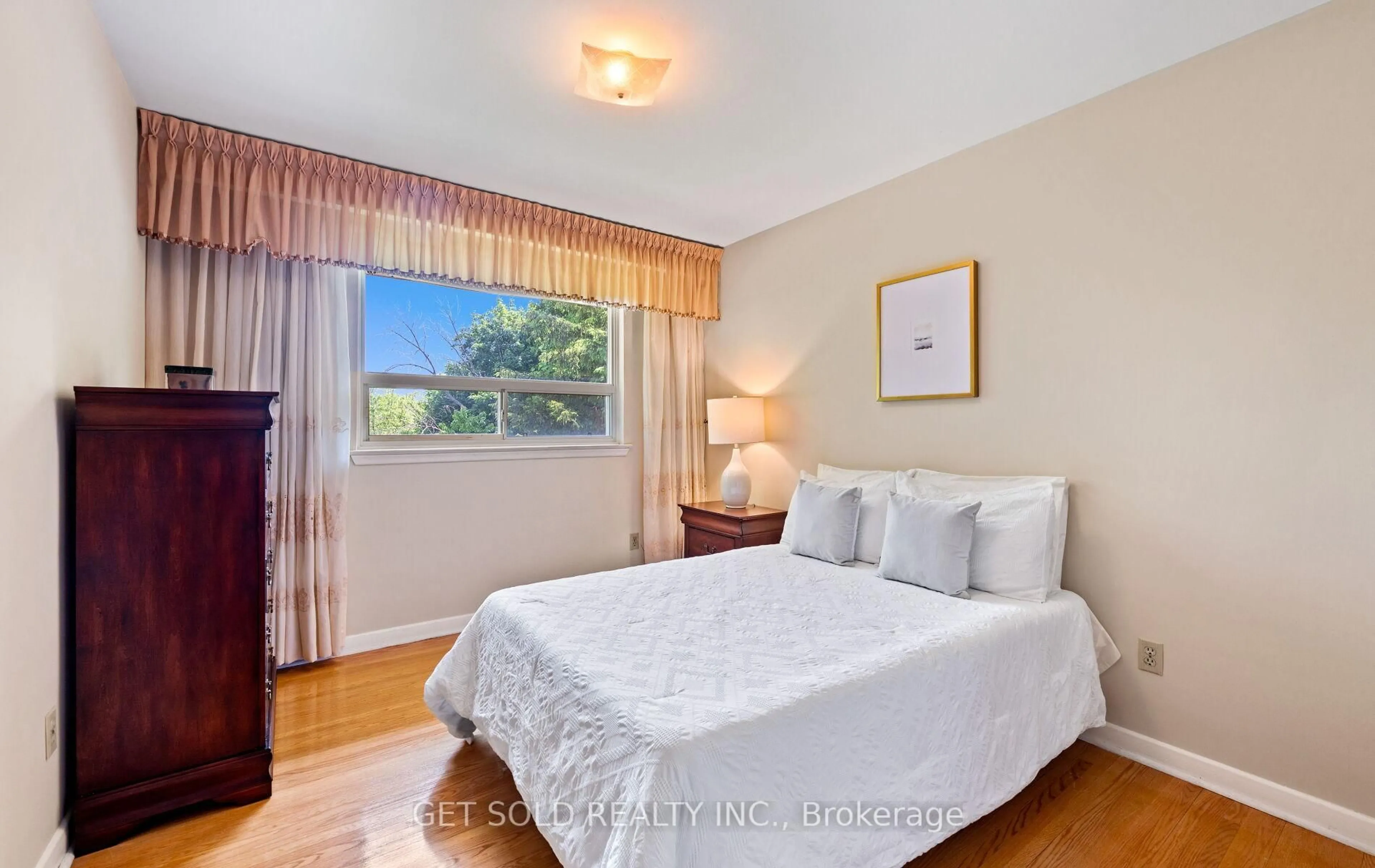 Bedroom with bed, wood/laminate floor for 43 Grovetree Rd, Toronto Ontario M9V 2Y4