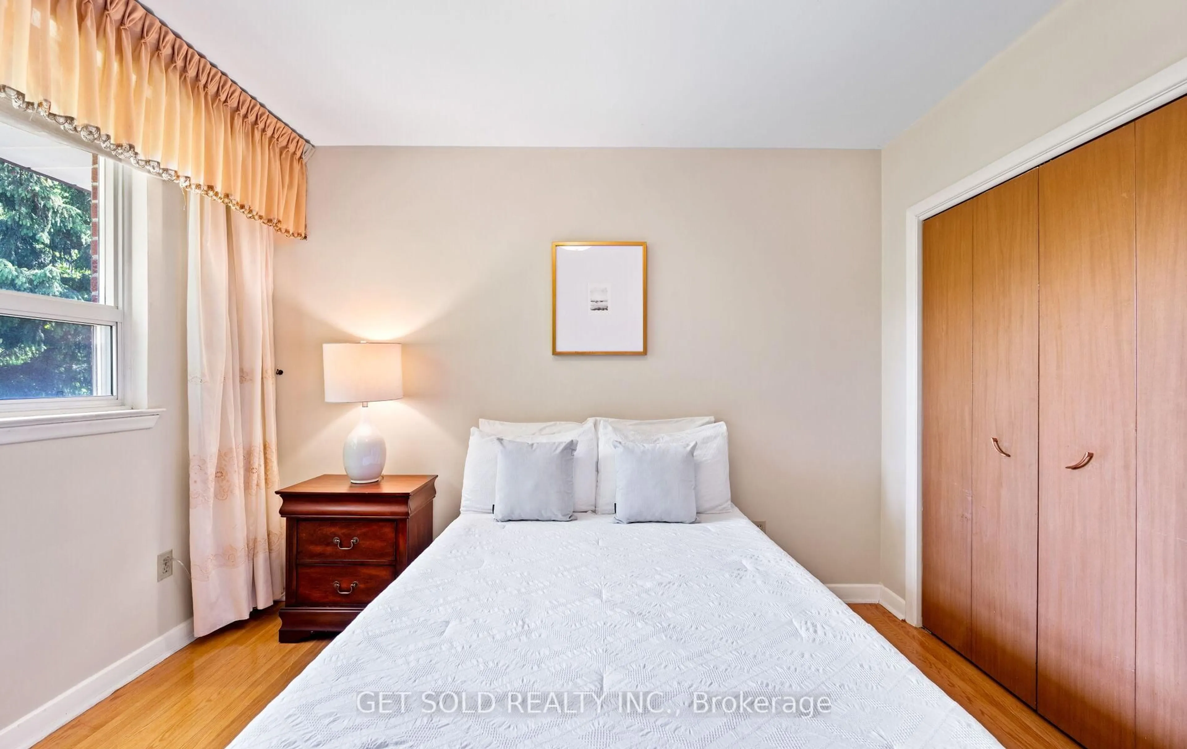 Bedroom with bed, wood/laminate floor for 43 Grovetree Rd, Toronto Ontario M9V 2Y4