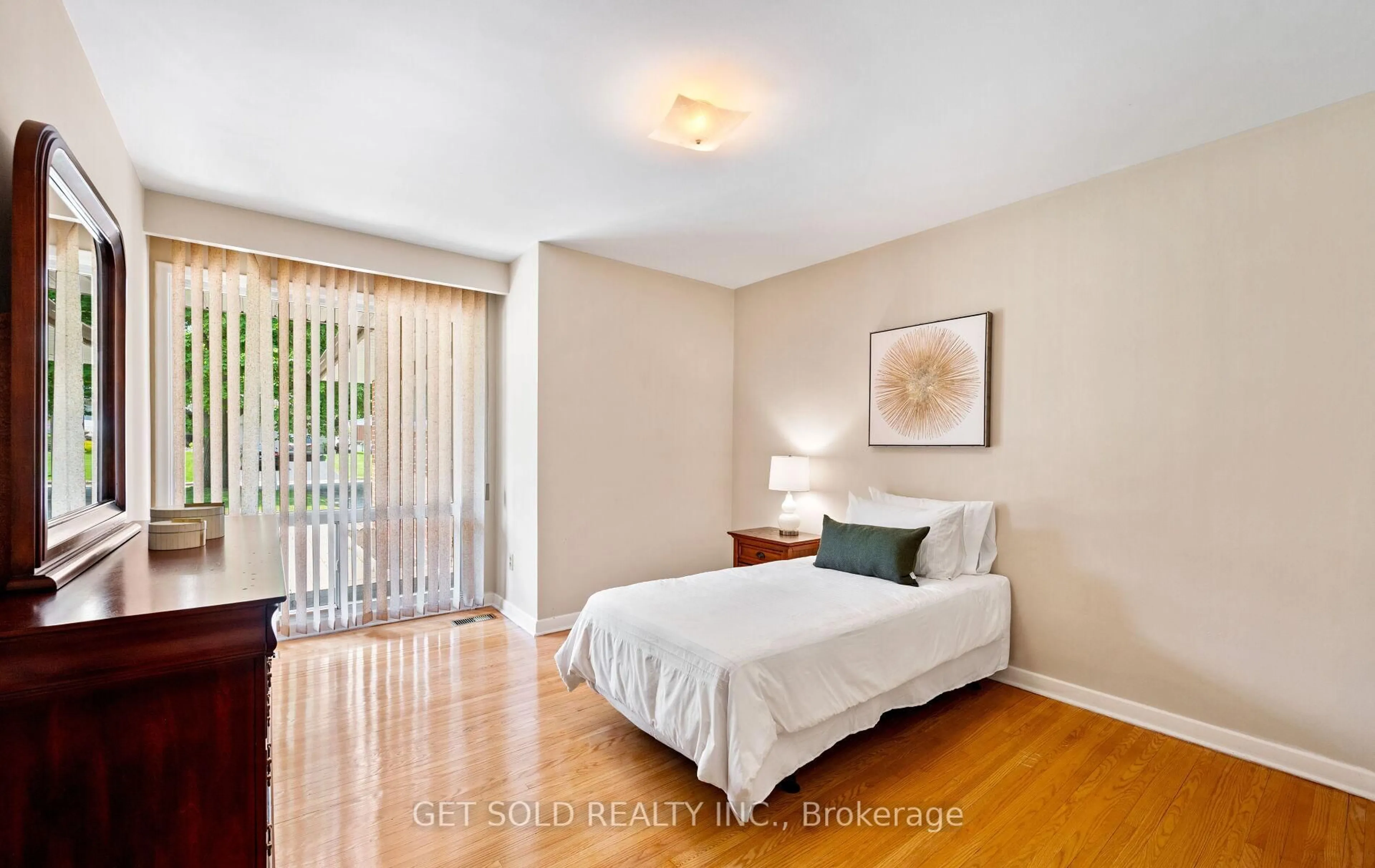 Bedroom with bed, wood/laminate floor for 43 Grovetree Rd, Toronto Ontario M9V 2Y4