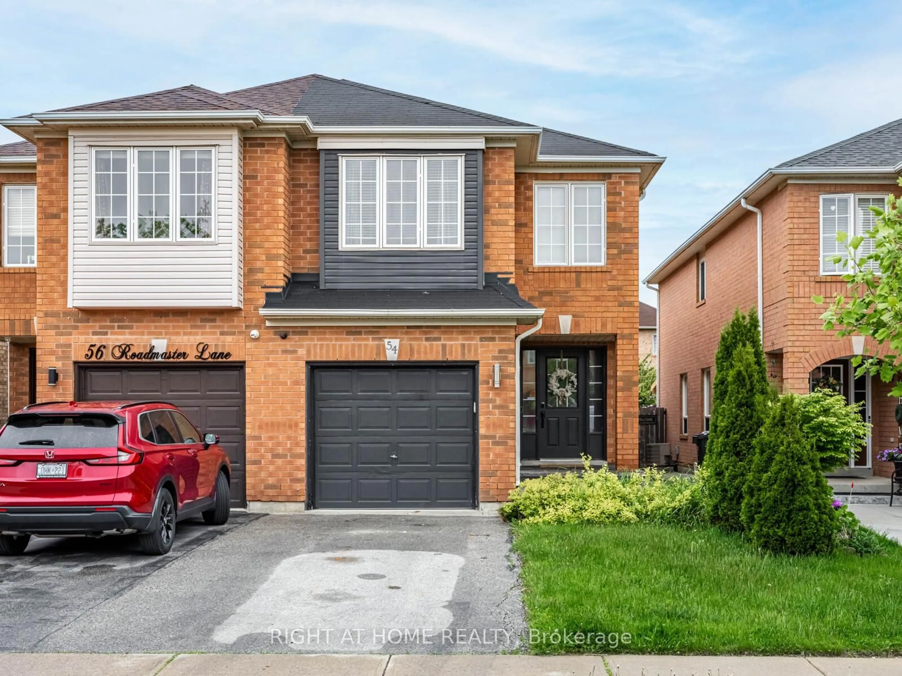 Home with brick exterior material, street for 54 Roadmaster Lane, Brampton Ontario L7A 3A7