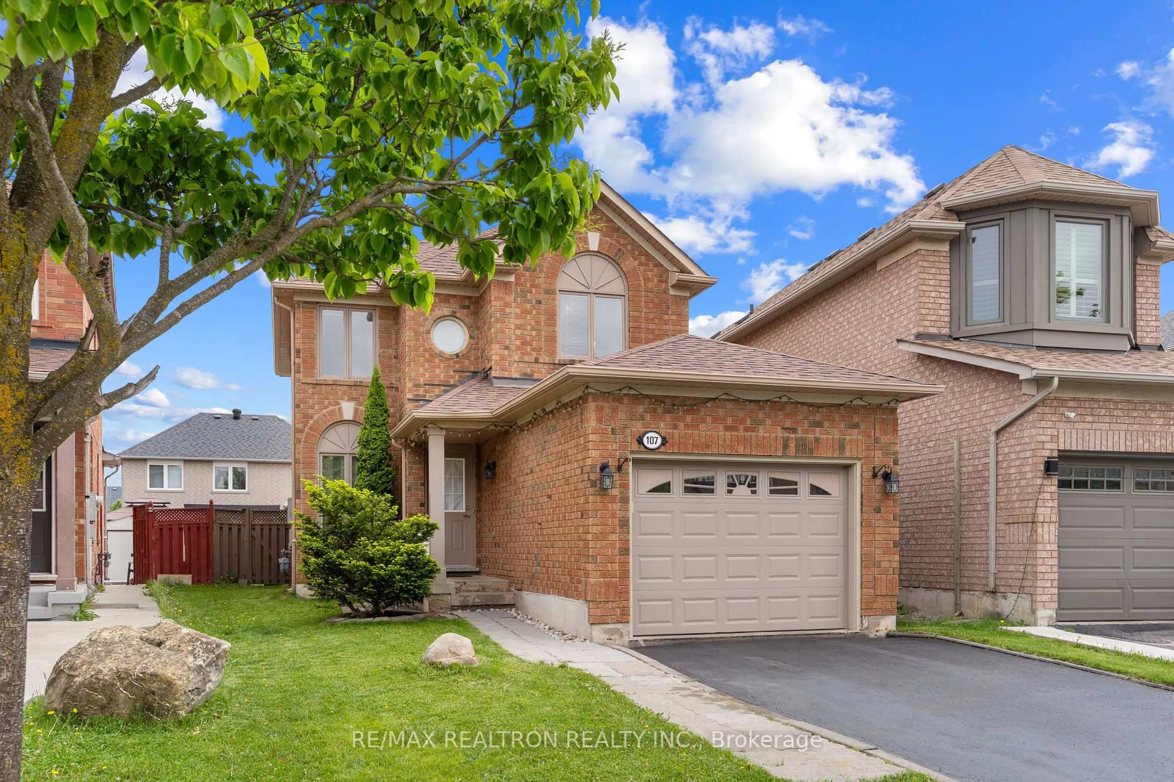 Home with brick exterior material, street for 107 Narrow Valley Cres, Brampton Ontario L6R 2M5