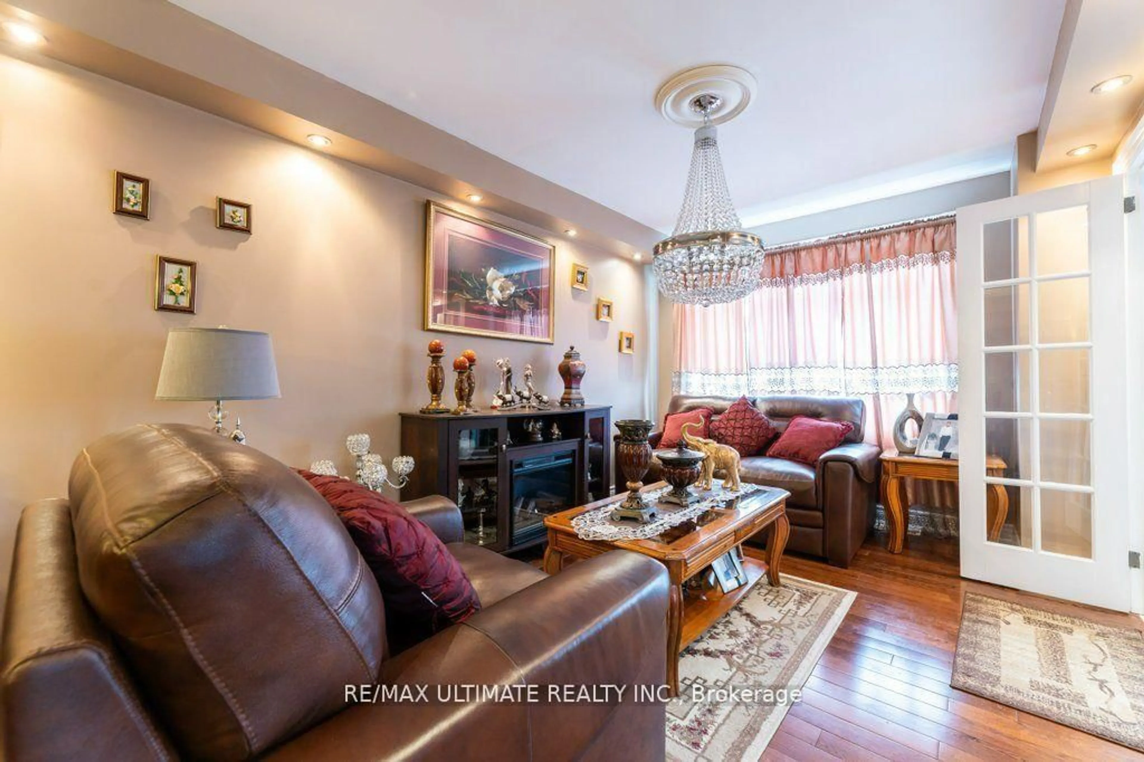 Living room with furniture, wood/laminate floor for 698 Old Weston Rd, Toronto Ontario M6N 3B8