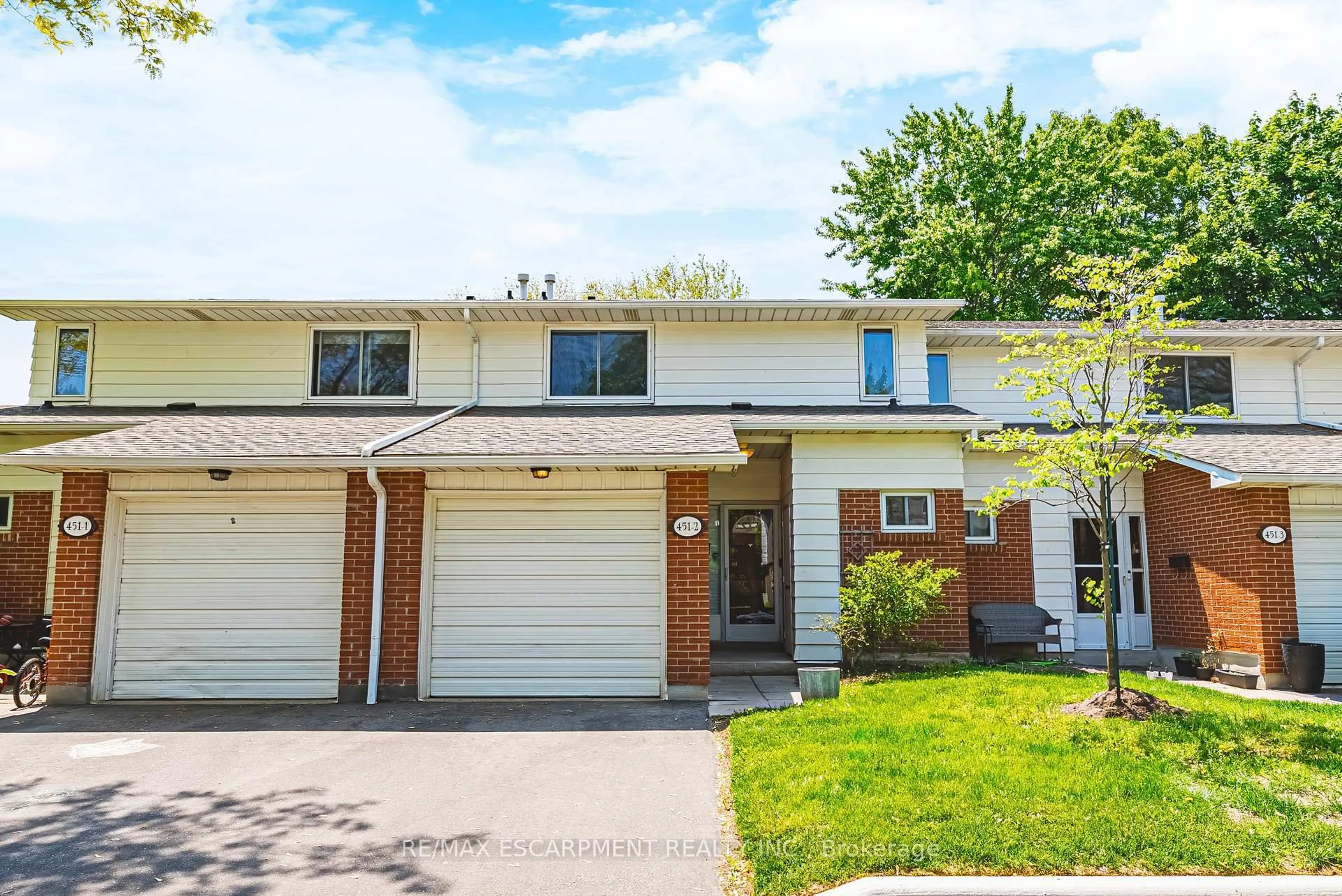 Home with brick exterior material, street for 451 Woodview Rd #2, Burlington Ontario L7N 2Z9