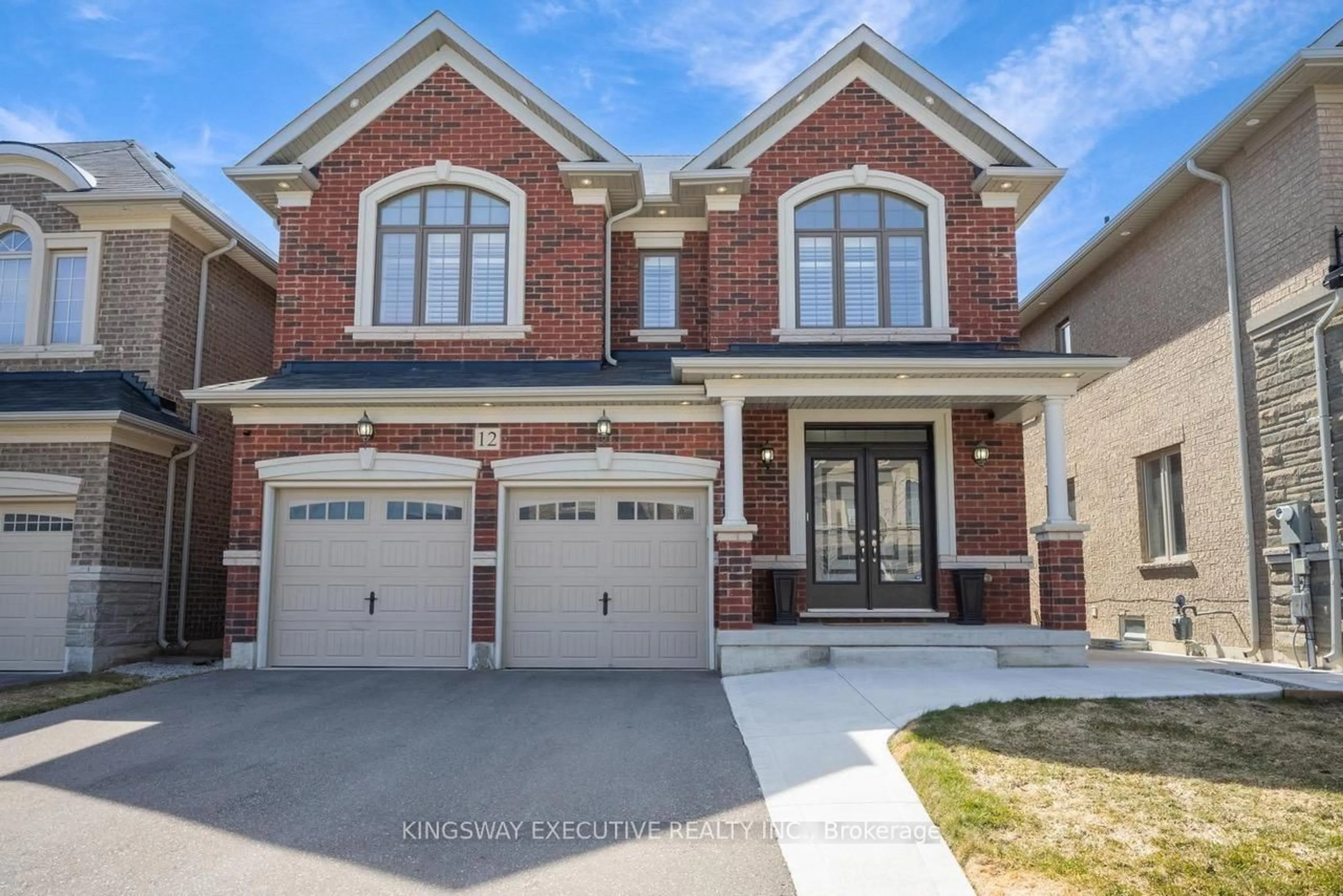 Home with brick exterior material, street for 12 ACTION Dr, Brampton Ontario L7A 4X8