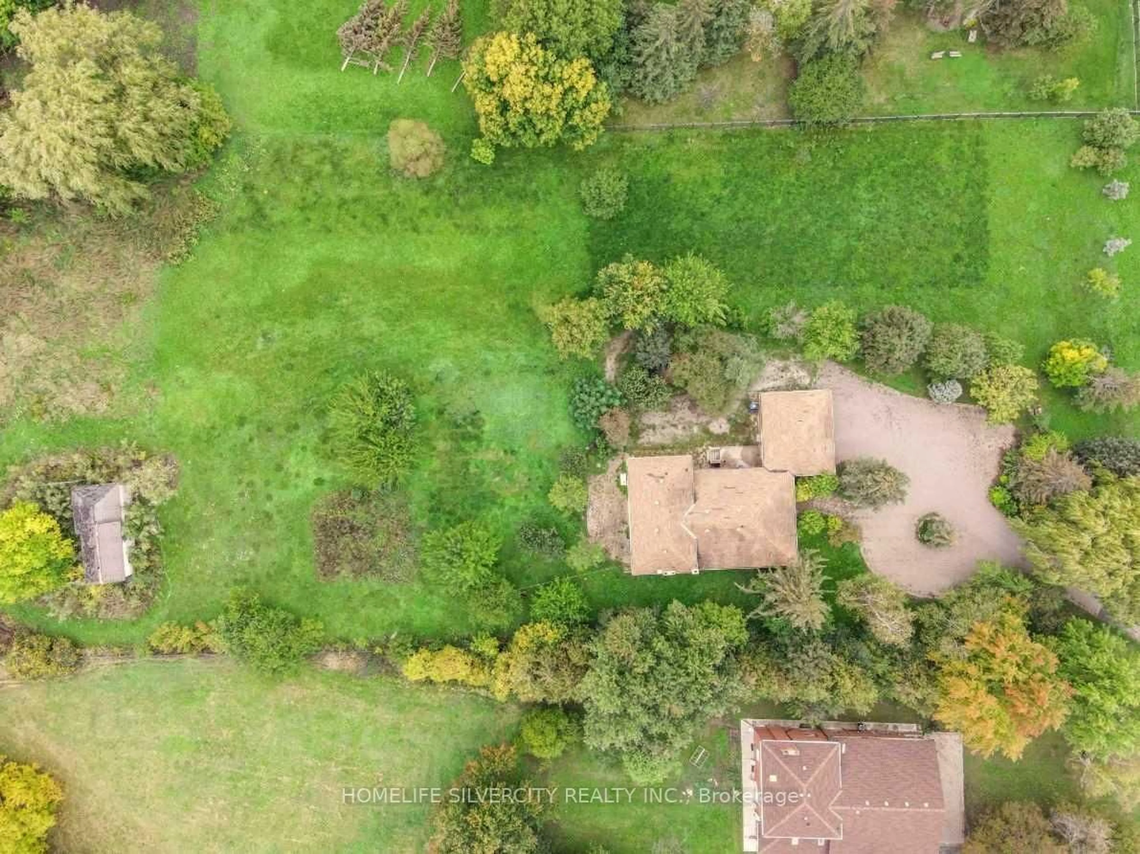 A pic from outside/outdoor area/front of a property/back of a property/a pic from drone, forest/trees view for 4395 Castlemore Rd, Brampton Ontario L6P 0W9