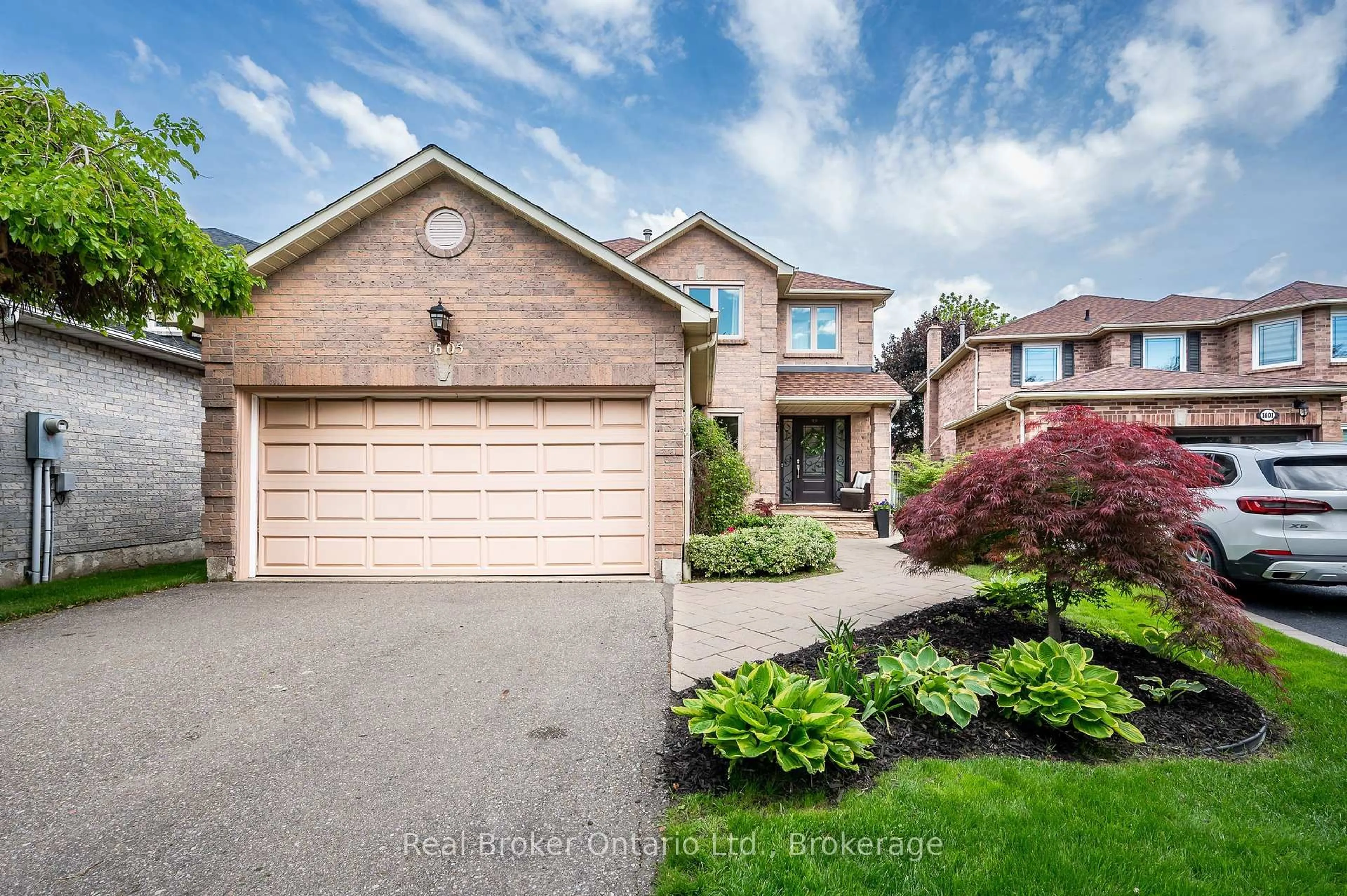 Home with brick exterior material, street for 1605 Wintergrove Gdns, Mississauga Ontario L5M 3Z9