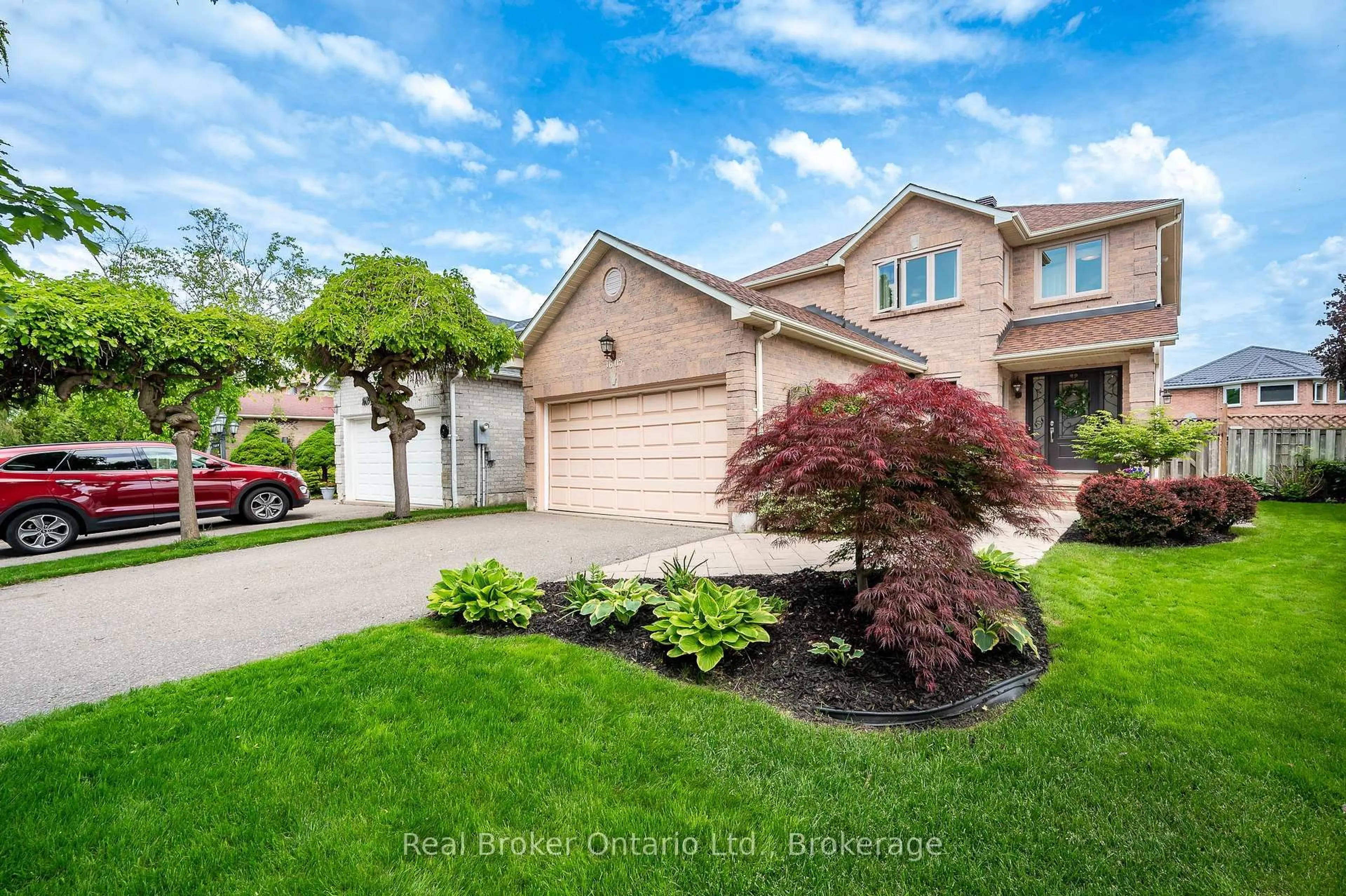 Home with brick exterior material, street for 1605 Wintergrove Gdns, Mississauga Ontario L5M 3Z9