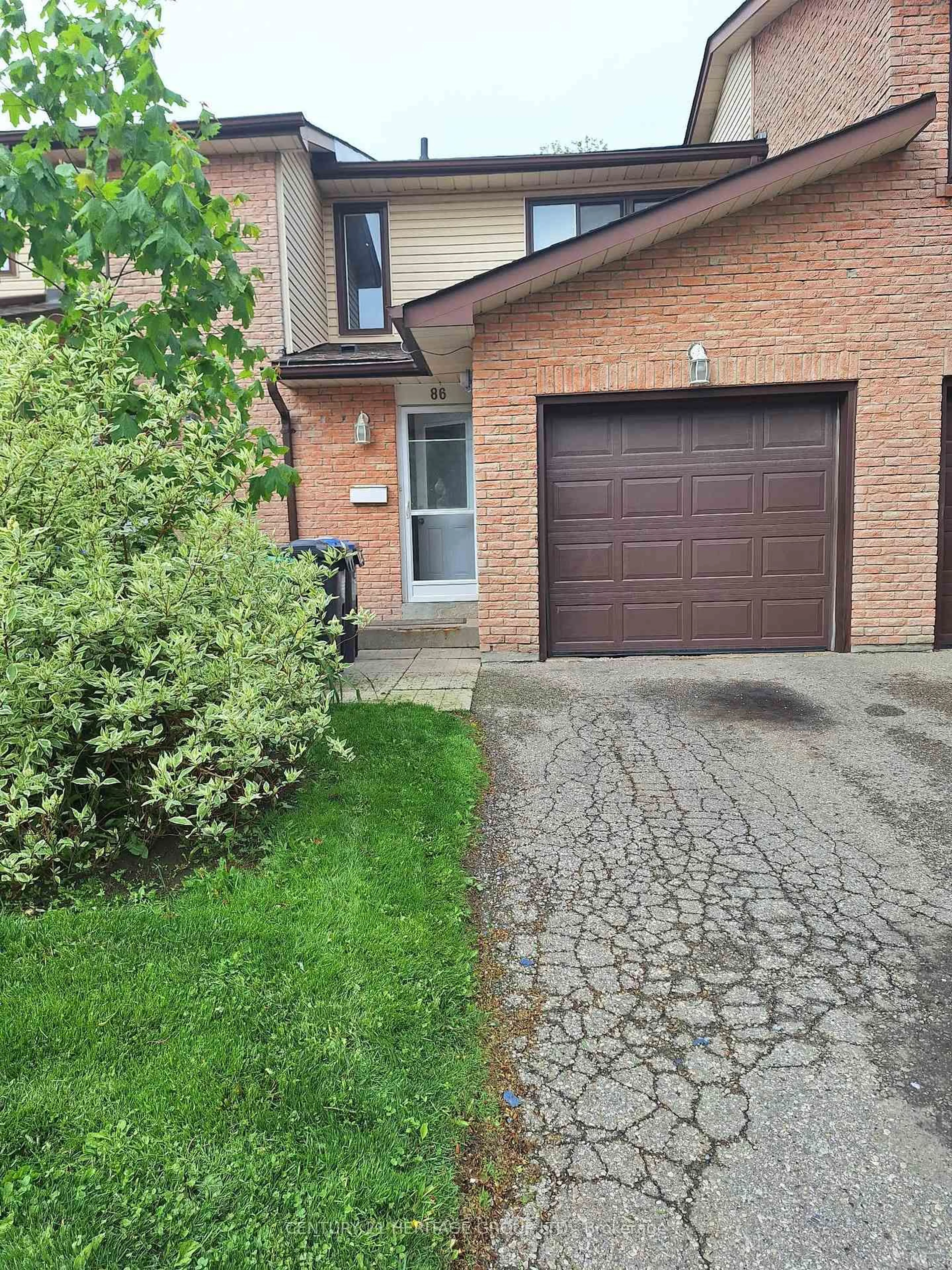 Home with brick exterior material, street for 86 Collins Cres, Brampton Ontario L6V 3N1