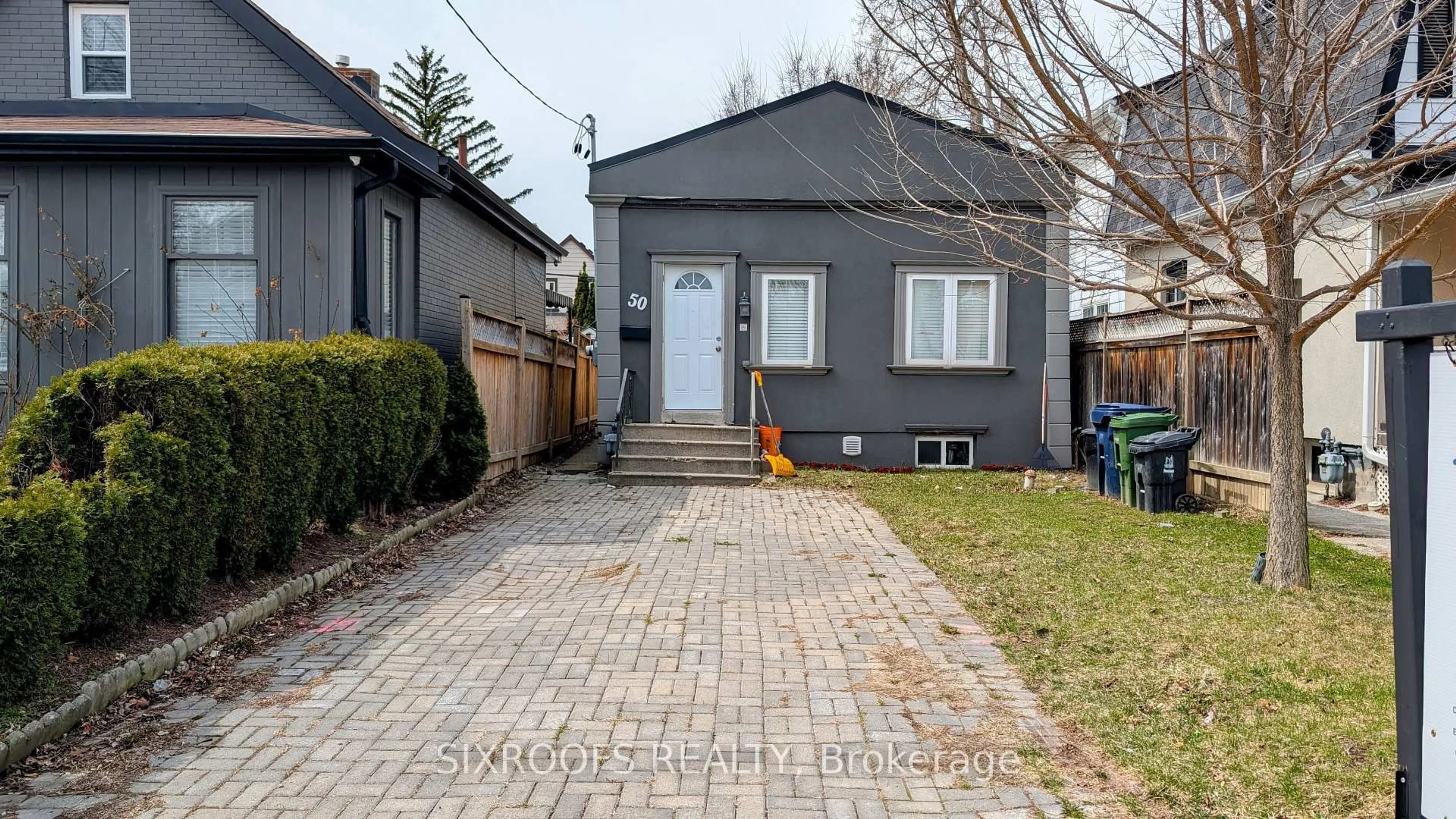 Home with brick exterior material, street for 50 Guestville Ave, Toronto Ontario M6N 4N2