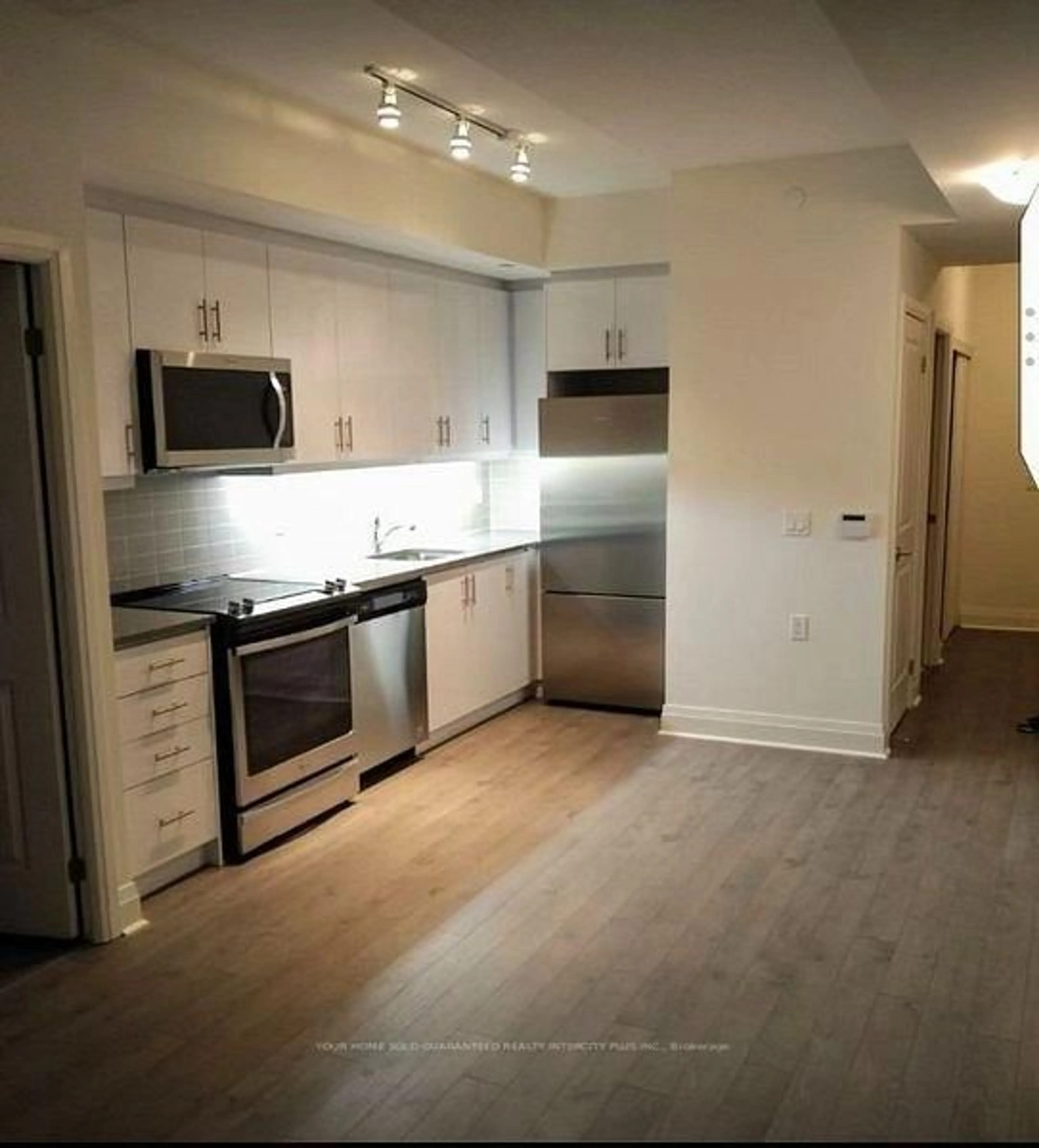 Standard kitchen, wood/laminate floor for 17 Zorra St #1805, Toronto Ontario M8Z 0C8