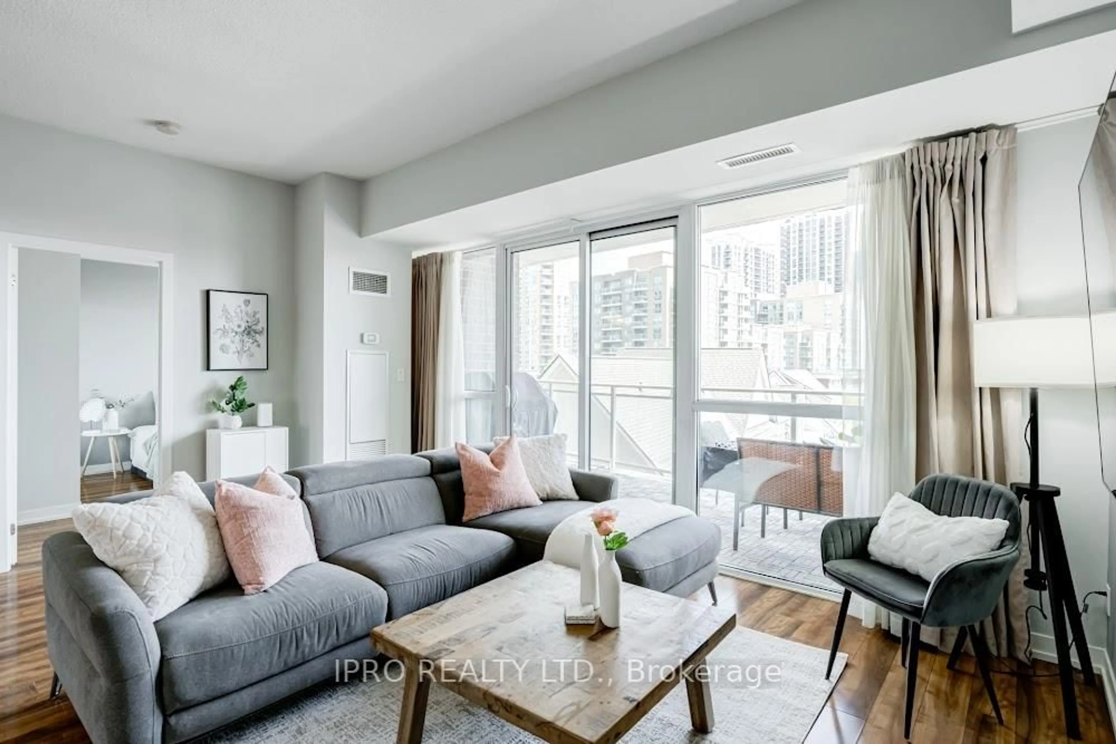 Living room with furniture, unknown for 5101 Dundas St #406, Toronto Ontario M9A 5G8