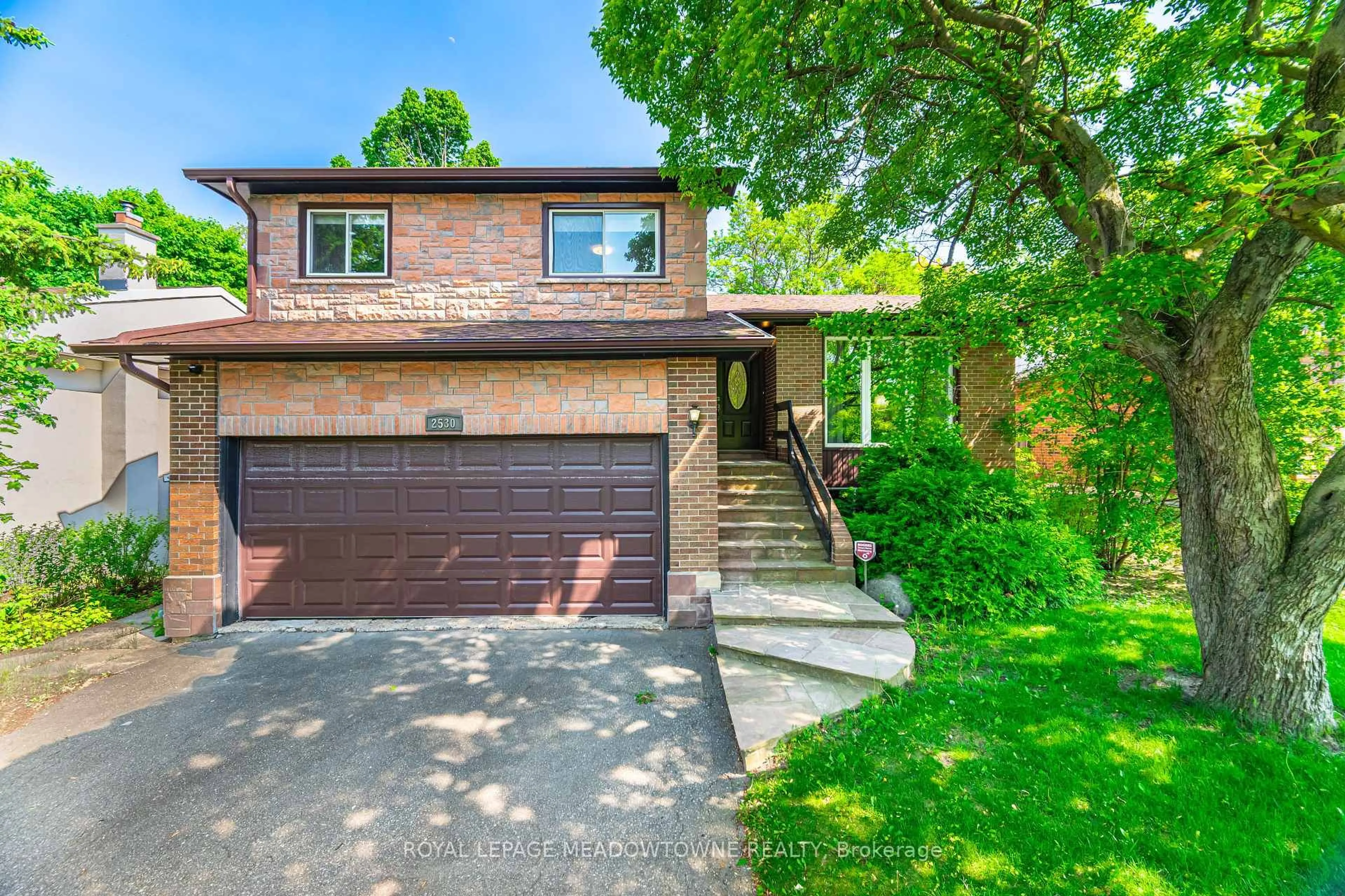 Home with brick exterior material, street for 2530 Windwood Dr, Mississauga Ontario L5N 2A9