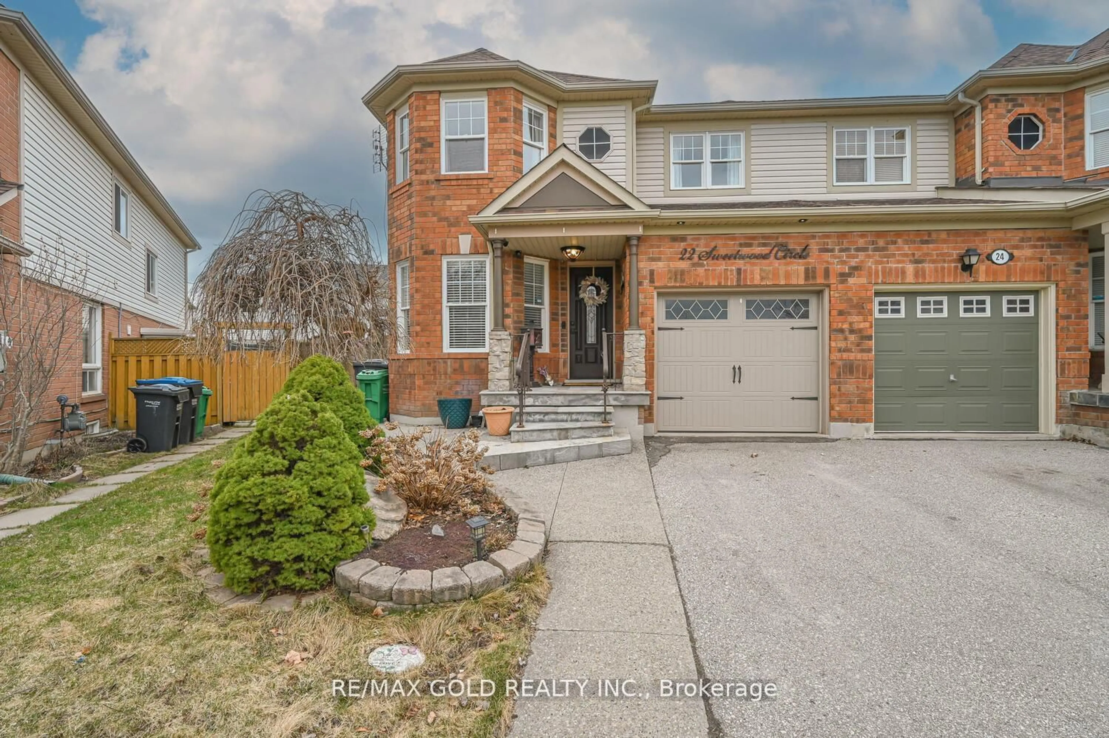 Home with brick exterior material, street for 22 Sweetwood Circ, Brampton Ontario L7A 2R9