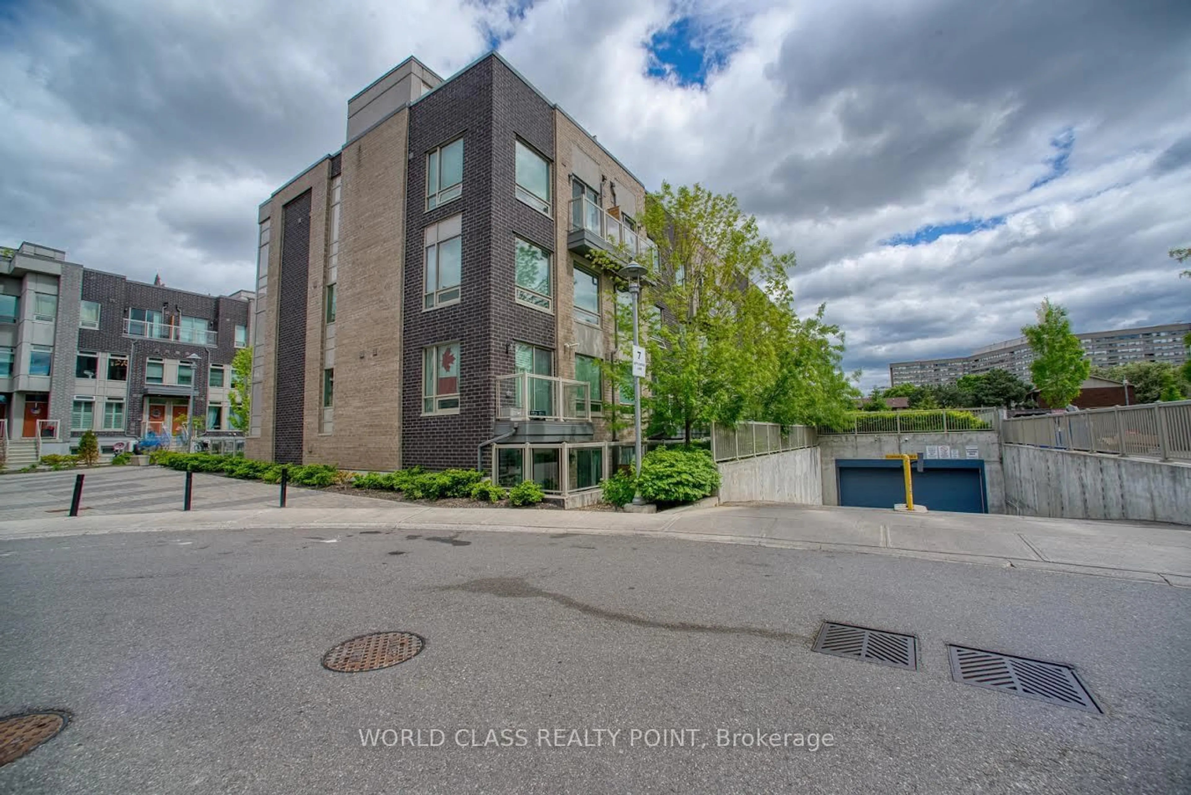 A pic from outside/outdoor area/front of a property/back of a property/a pic from drone, building for 7 Applewood Lane #221, Toronto Ontario M9C 0C1