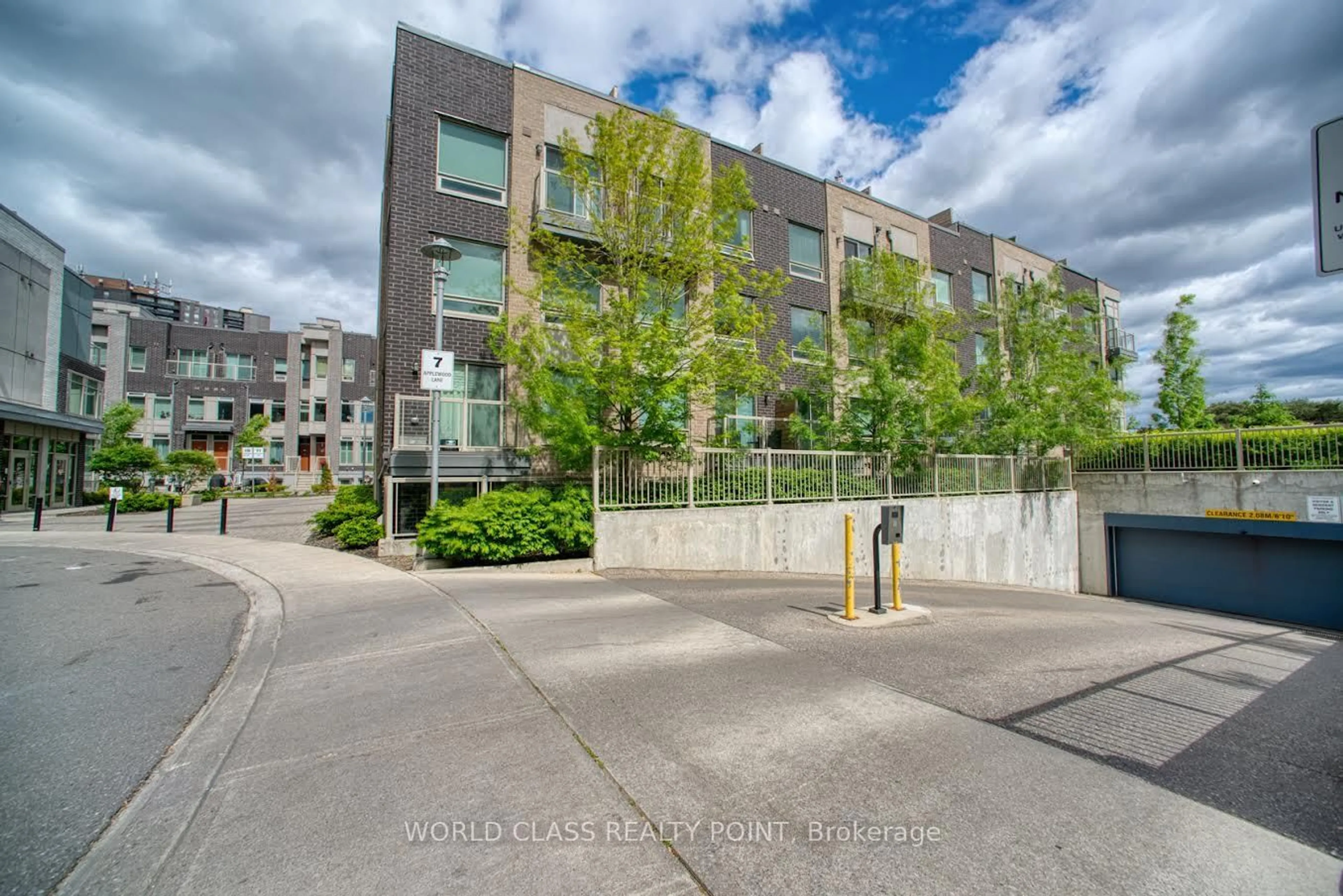 A pic from outside/outdoor area/front of a property/back of a property/a pic from drone, street for 7 Applewood Lane #221, Toronto Ontario M9C 0C1