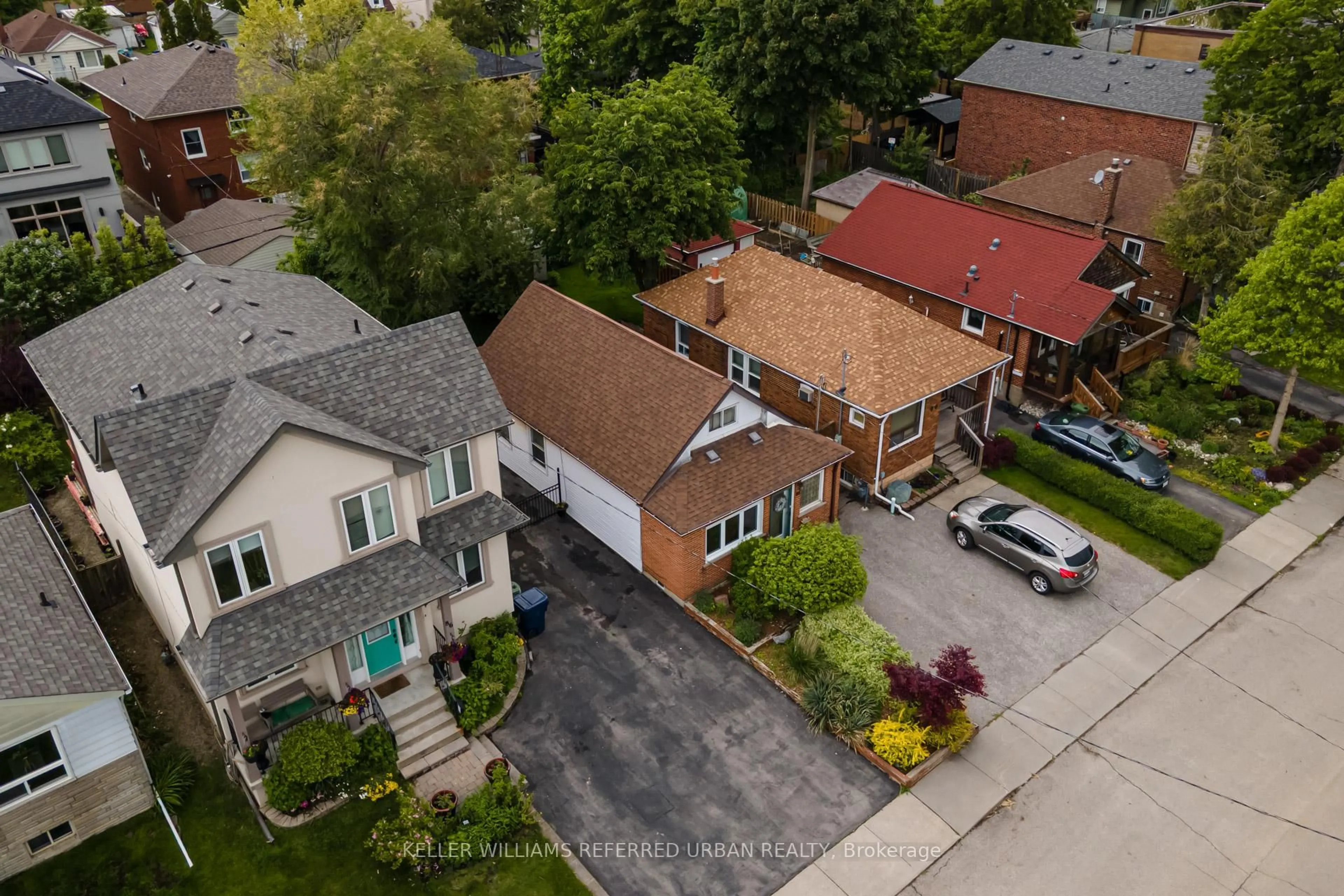 A pic from outside/outdoor area/front of a property/back of a property/a pic from drone, street for 88 Sixteenth St, Toronto Ontario M8V 3K1