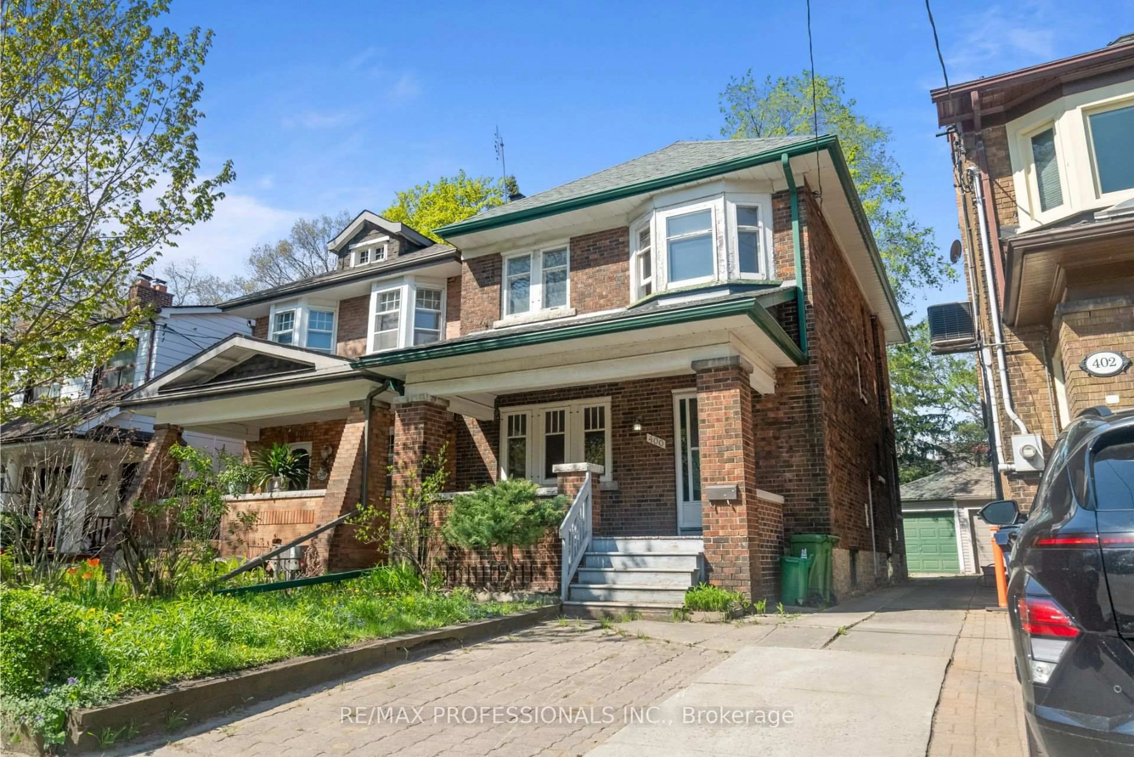 Home with brick exterior material, street for 400 Willard Ave, Toronto Ontario M6S 3R5