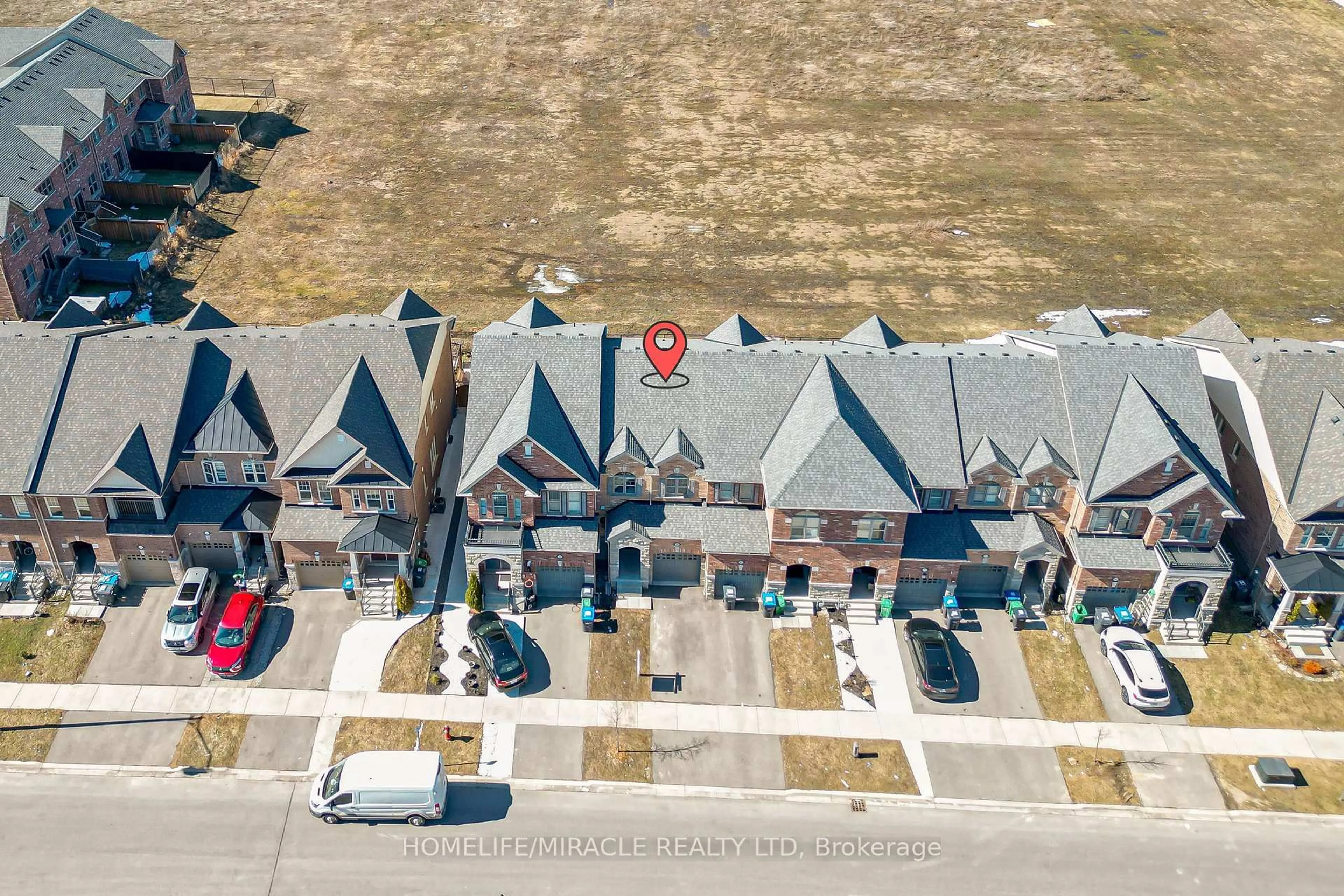 A pic from outside/outdoor area/front of a property/back of a property/a pic from drone, street for 26 Hogan Manor Dr, Brampton Ontario L7A 4V3