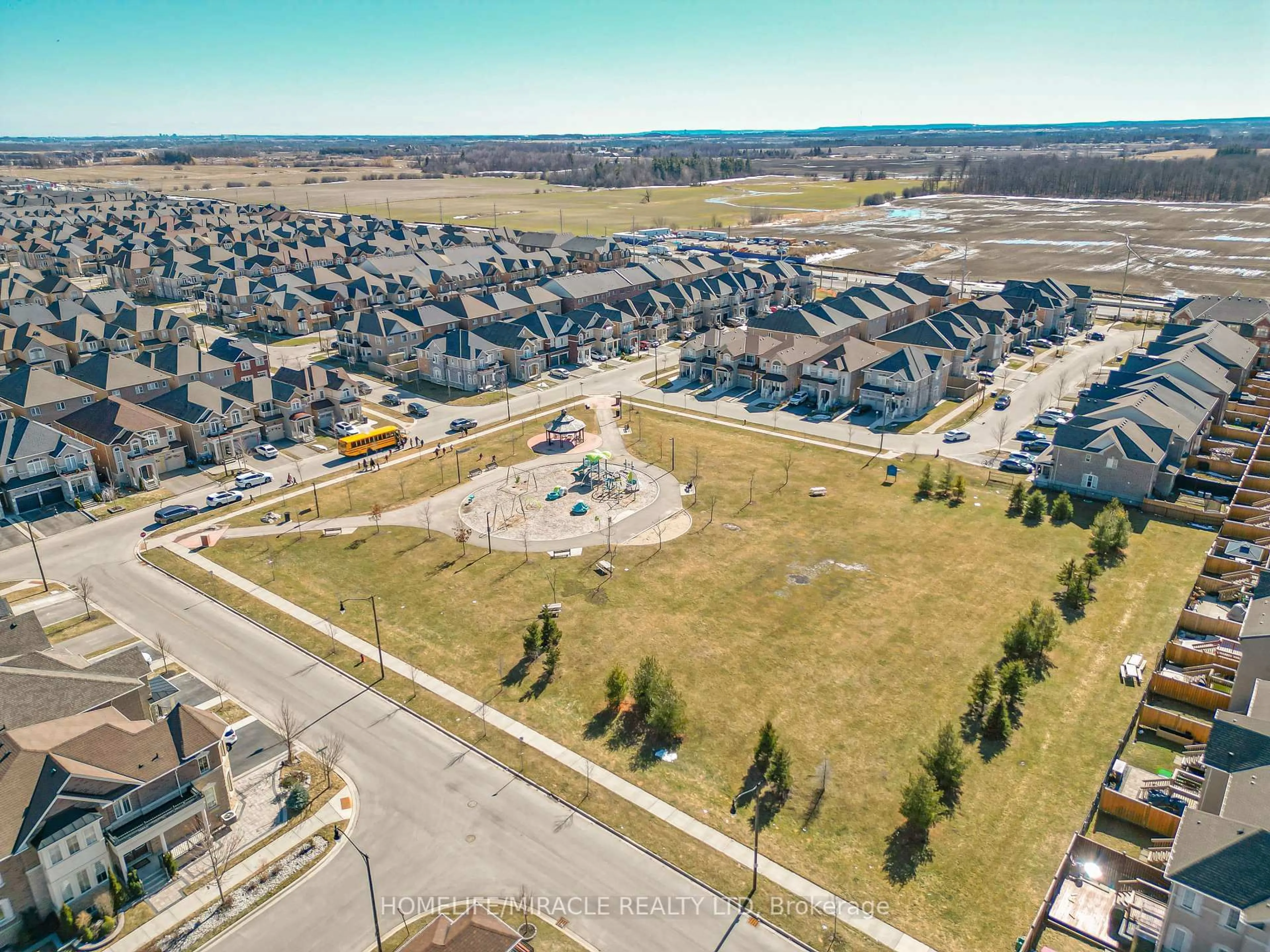 A pic from outside/outdoor area/front of a property/back of a property/a pic from drone, street for 26 Hogan Manor Dr, Brampton Ontario L7A 4V3
