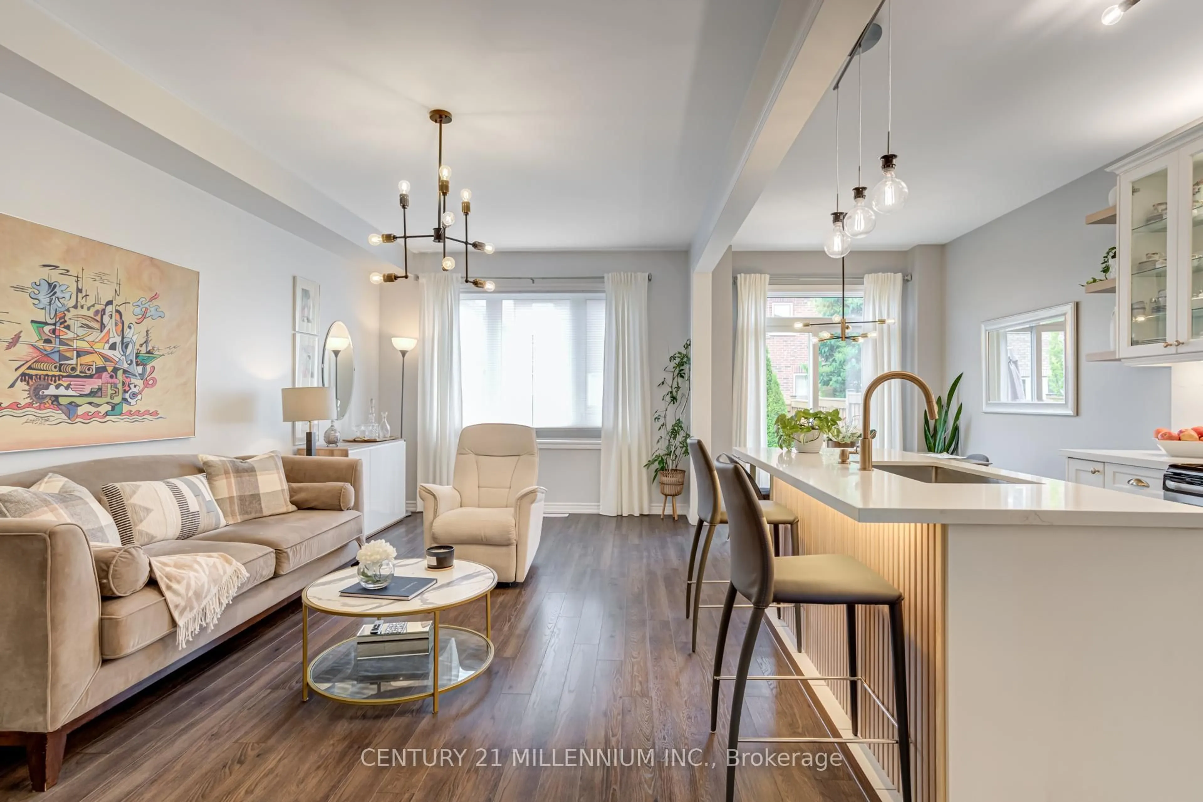Living room with furniture, wood/laminate floor for 100 Kempenfelt Dr, Brampton Ontario L7A 0A7