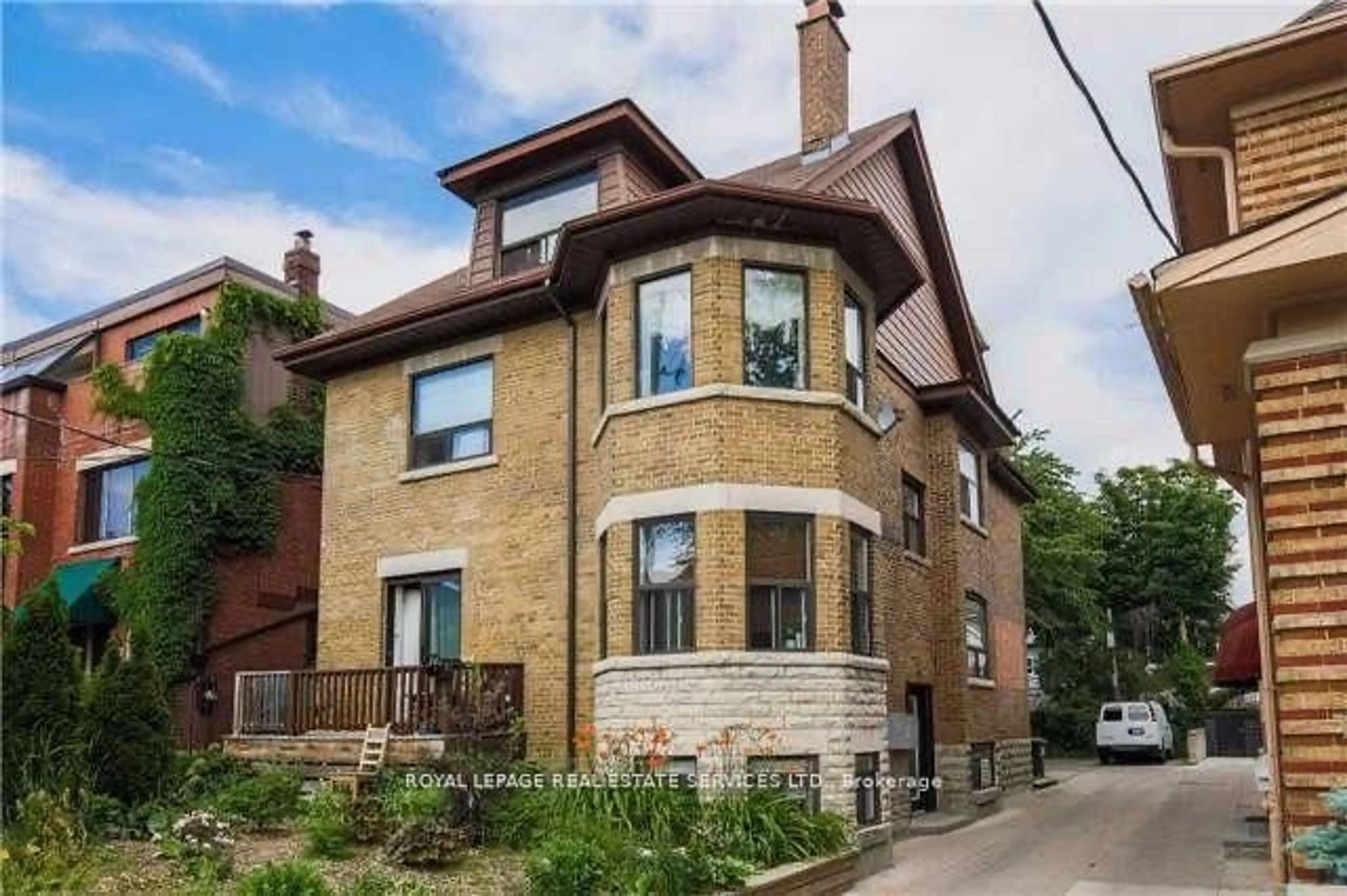 Home with brick exterior material, street for 5 Northcliffe Blvd, Toronto Ontario M6H 3G9