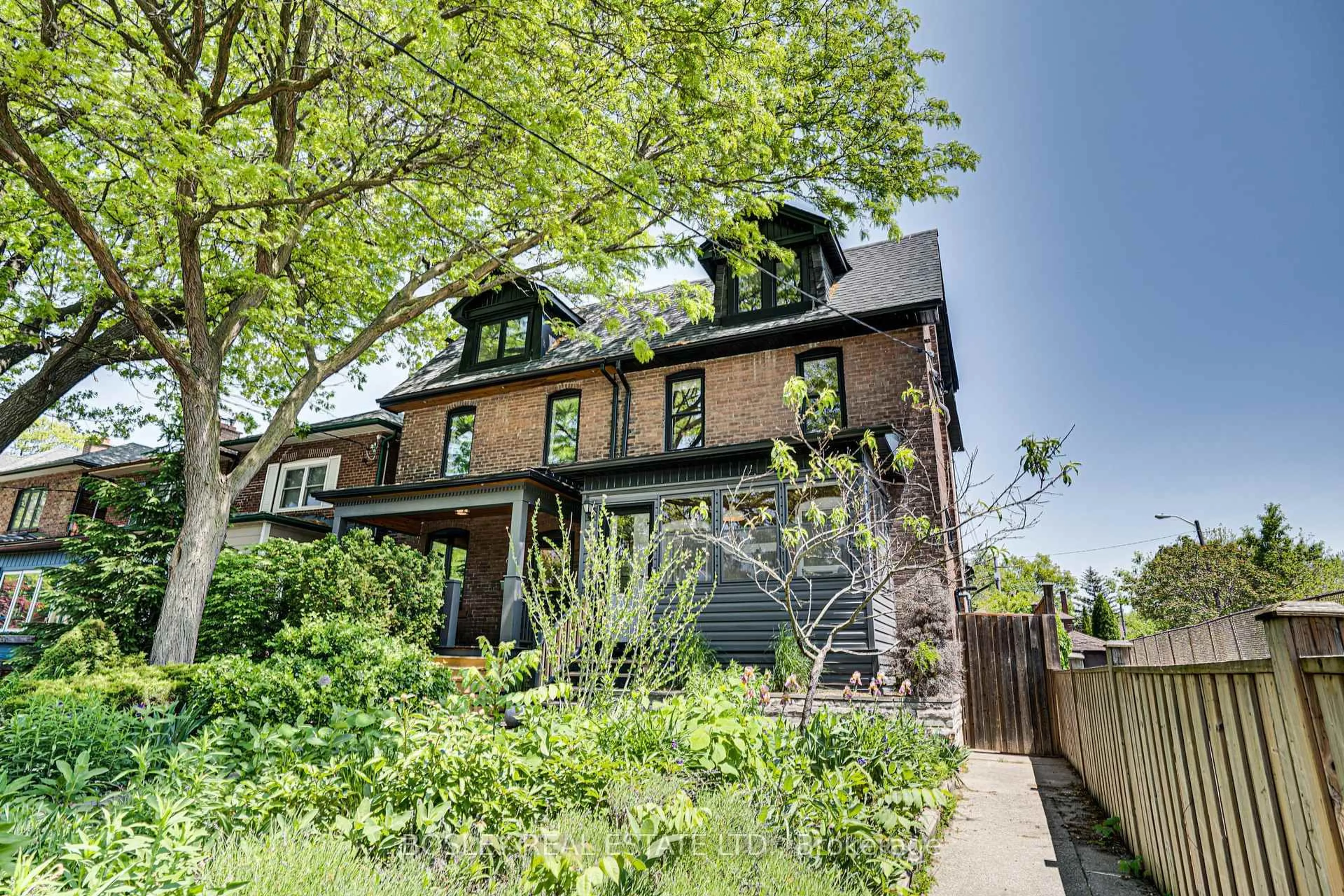 Home with brick exterior material, street for 627 Willard Ave, Toronto Ontario M6S 3S1