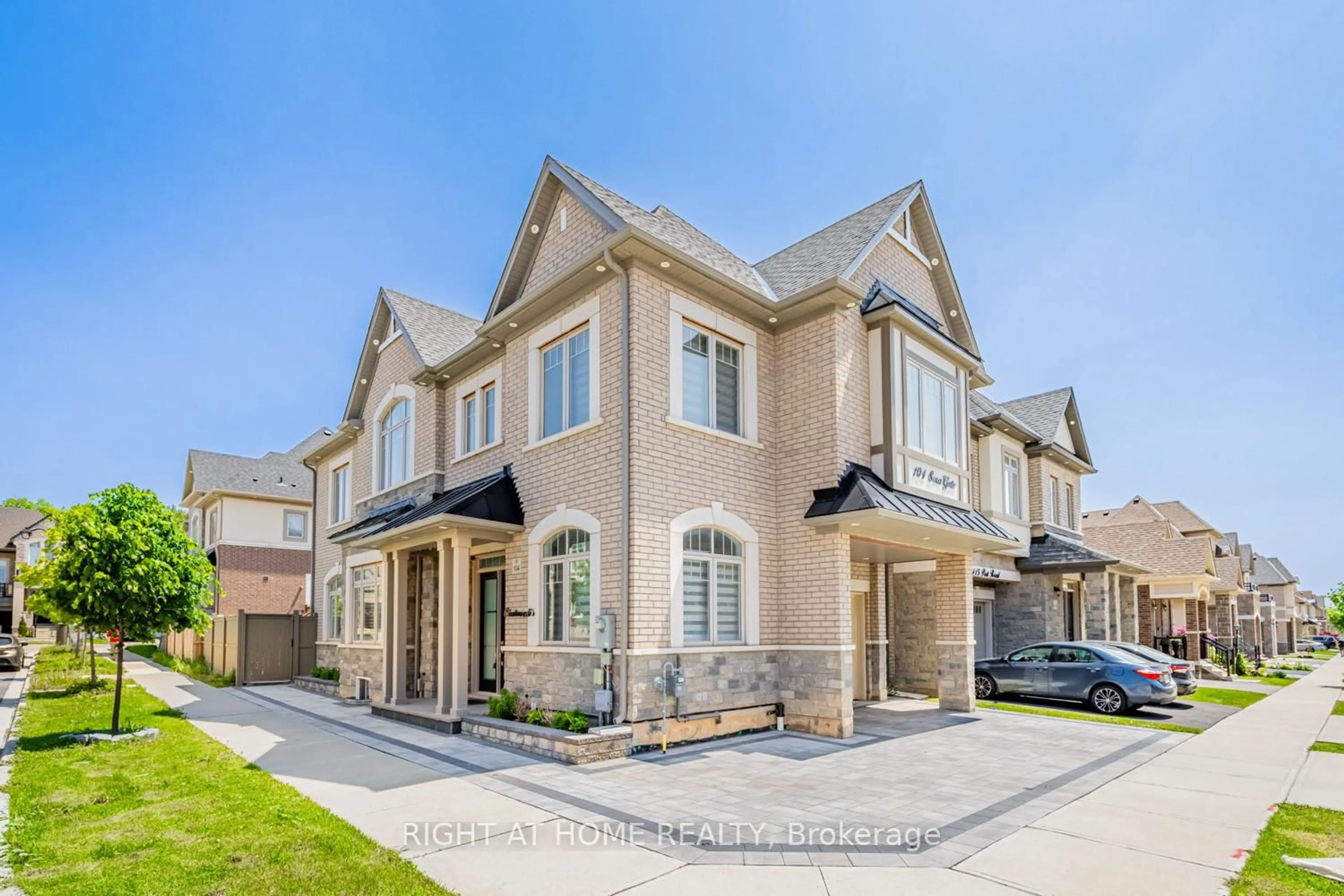 Home with brick exterior material, street for 104 Sora Gate, Oakville Ontario L6H 0Y4