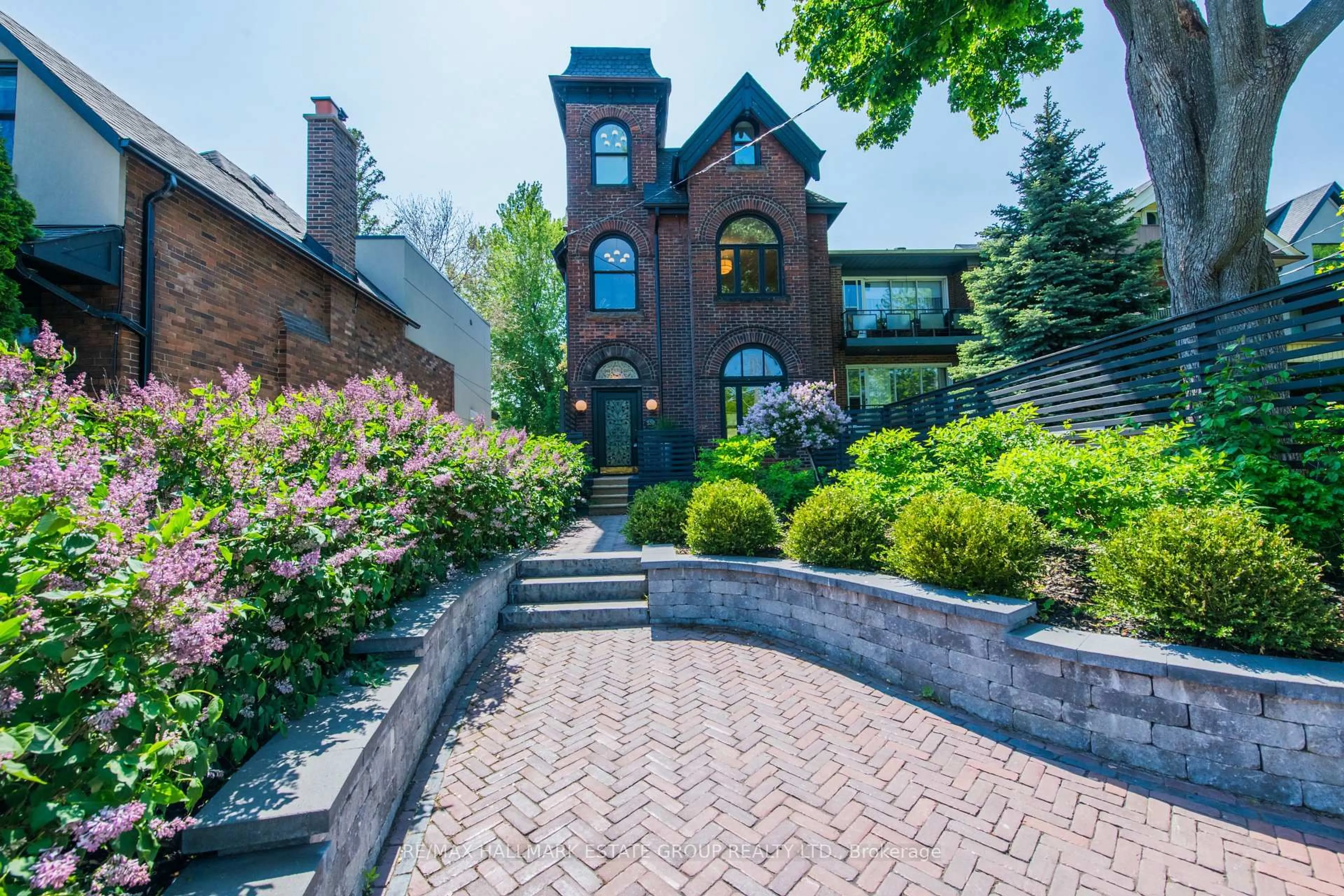 Home with brick exterior material, street for 570 Indian Rd, Toronto Ontario M6P 2C2