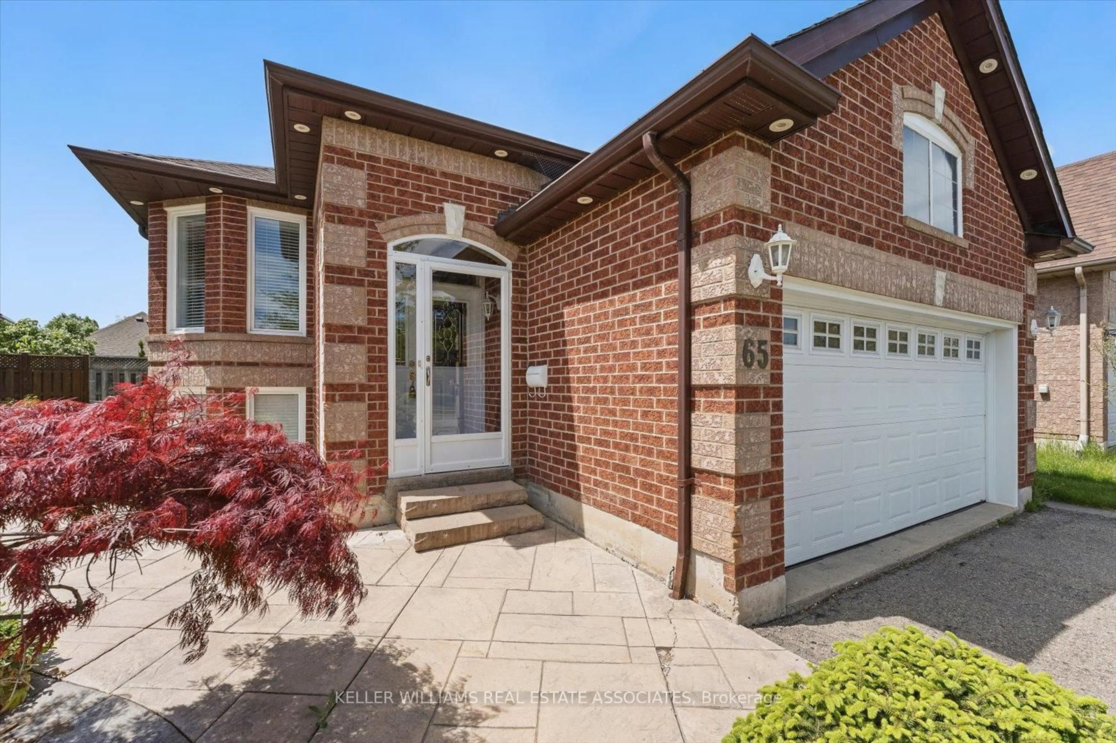 Home with brick exterior material, street for 65 Summerfield Cres, Brampton Ontario L6X 4L2