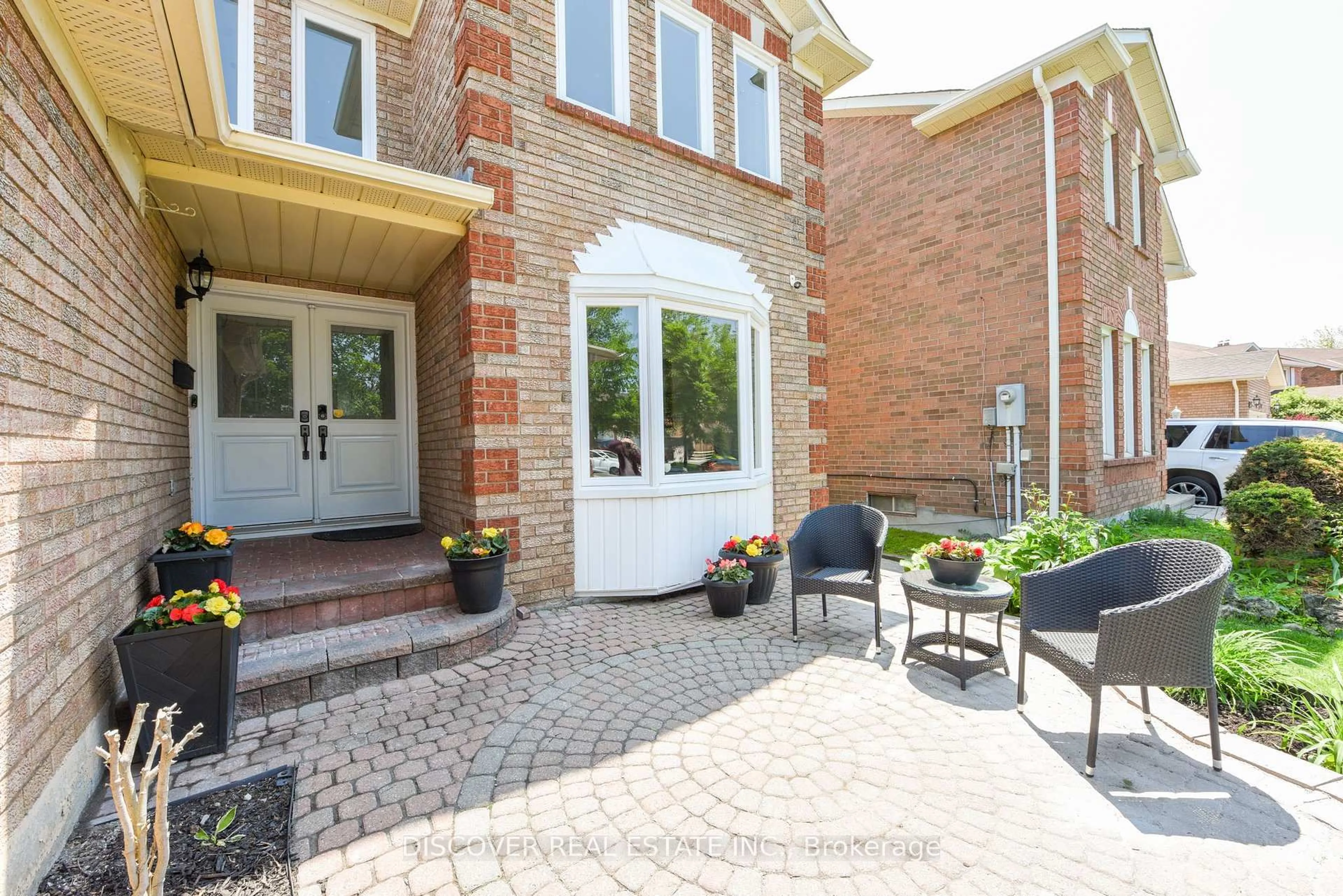 Home with brick exterior material, street for 2594 Ambercroft Tr, Mississauga Ontario L5M 4K3